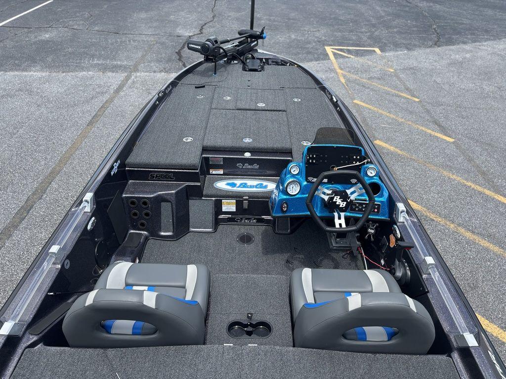 2023 Bass Cat Cougar FTD boat interior with steering console and seating.