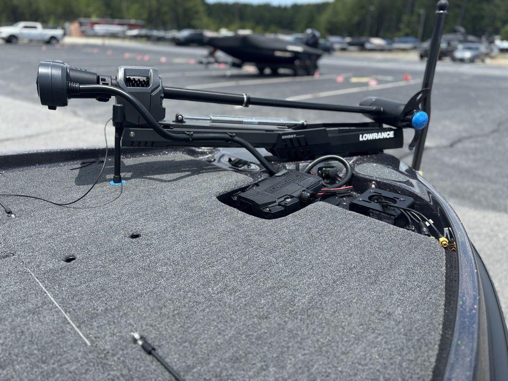 2023 Bass Cat Cougar FTD boat with Lowrance trolling motor on deck.