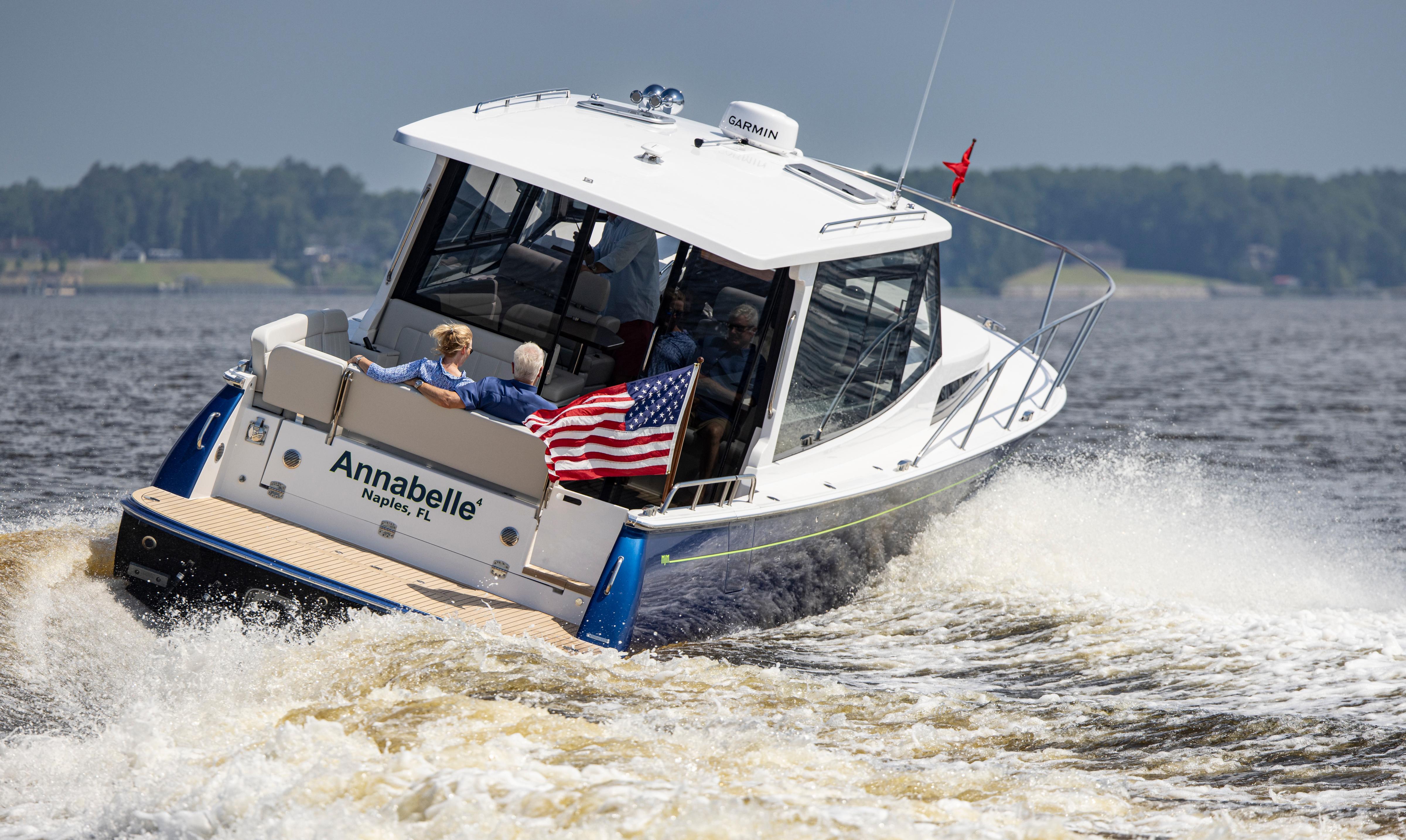 2025 MJM 42 boat cruising on water, displaying American flag, named u0022Annabelle.u0022
