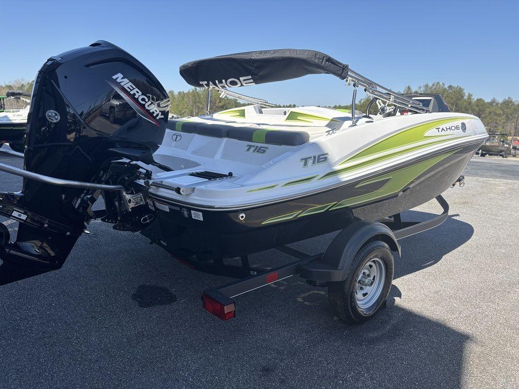 2024 Tahoe T16 boat with Mercury engine on trailer, outdoor setting.