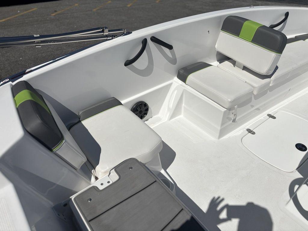 2024 Tahoe T16 boat interior with white and green seating, featuring modern design and comfort.