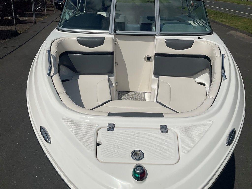 2018 Chaparral 203 VR boat with spacious seating and sleek design.