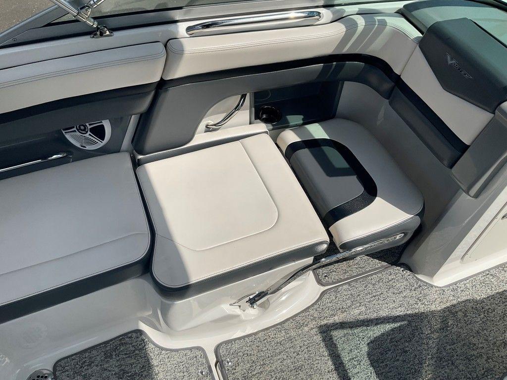 2018 Chaparral 203 VR boat interior with cushioned seating and modern design.