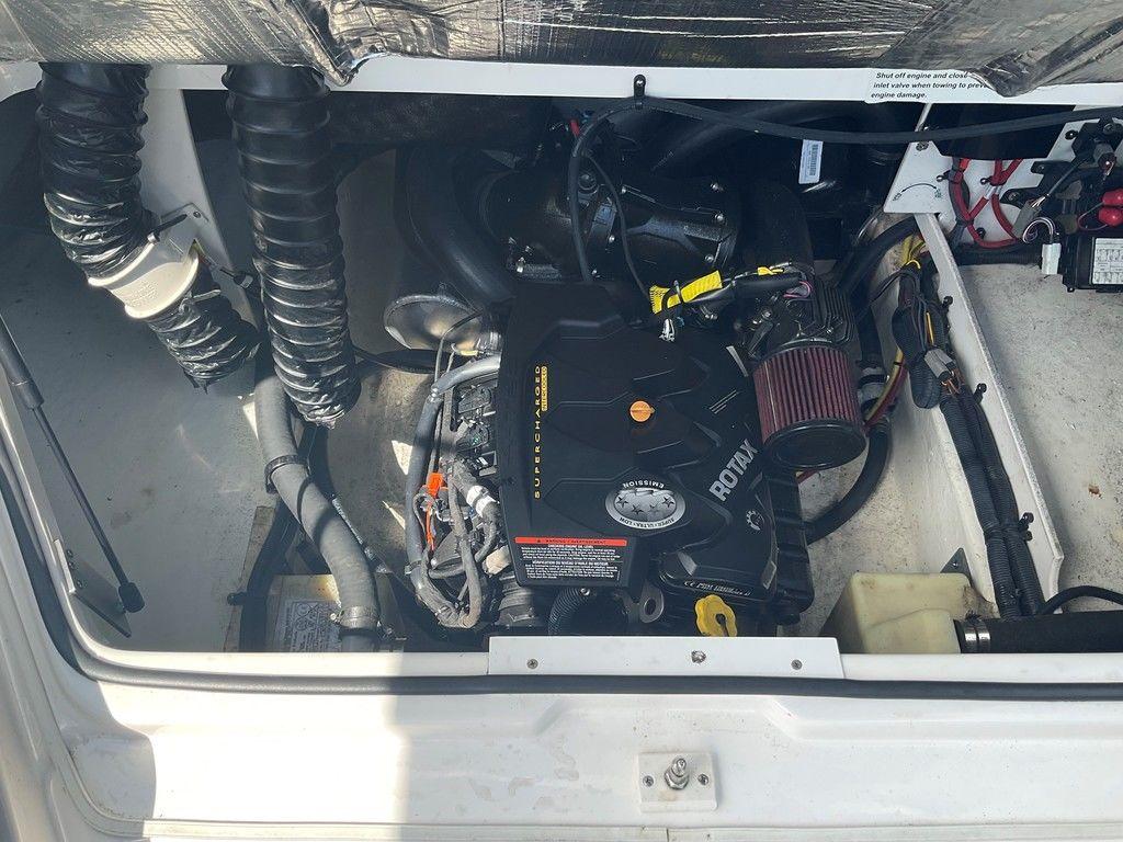 Engine compartment of a 2018 Chaparral 203 VR boat, featuring a Rotax engine.