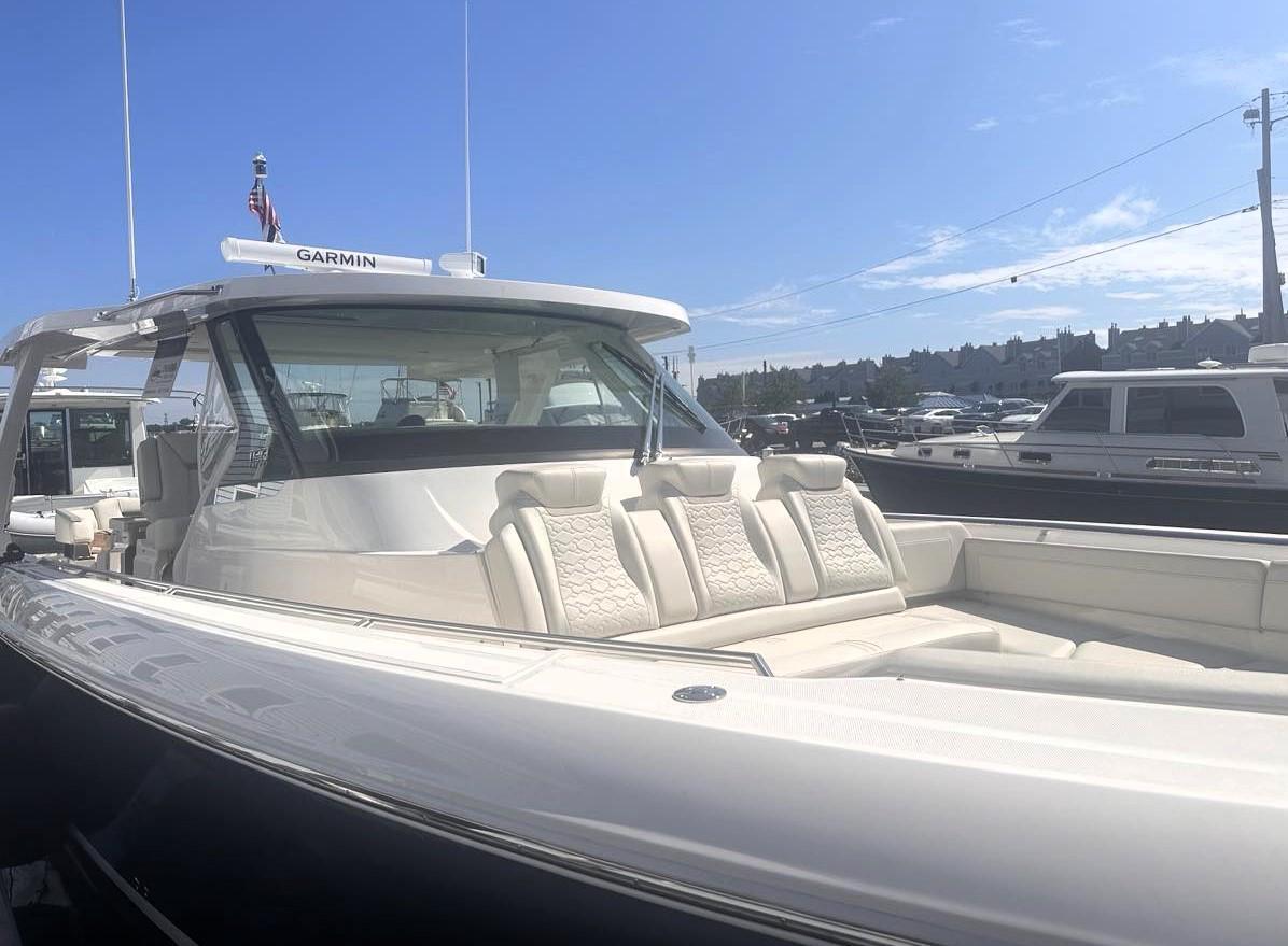 2024 Tiara Yachts 43 LS luxury boat with sleek design and comfortable seating.