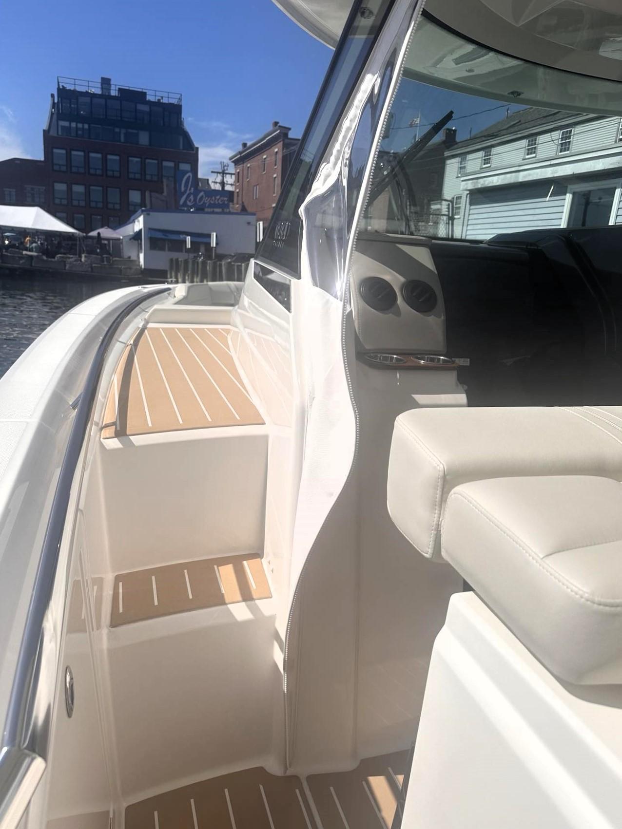 2024 Tiara Yachts 43 LS boat interior with sleek design and comfortable seating.