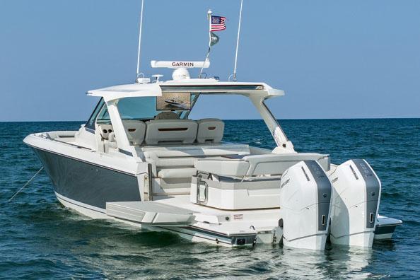 2024 Tiara Yachts 43 LS luxury boat with dual engines on open water.