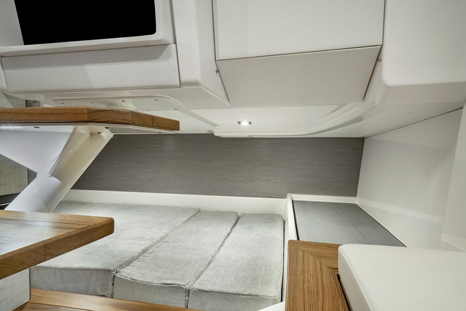 2024 Tiara Yachts 43 LS interior cabin with modern design and wooden accents.