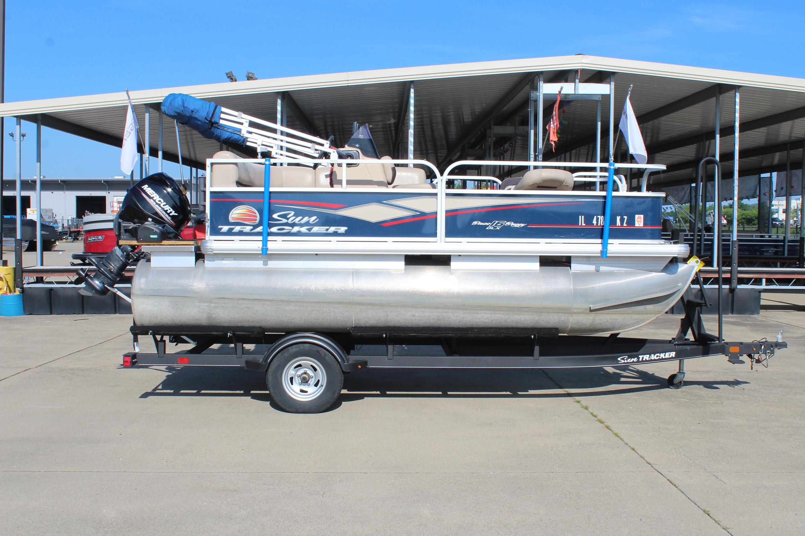 2019 Sun Tracker Bass Buggy 16 XL Select pontoon boat on trailer.