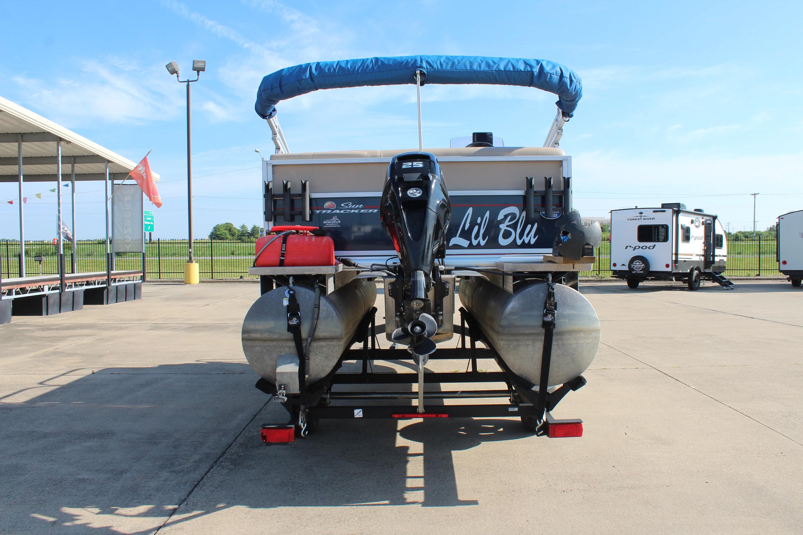 2019 Sun Tracker Bass Buggy 16 XL Select pontoon boat on trailer, rear view.
