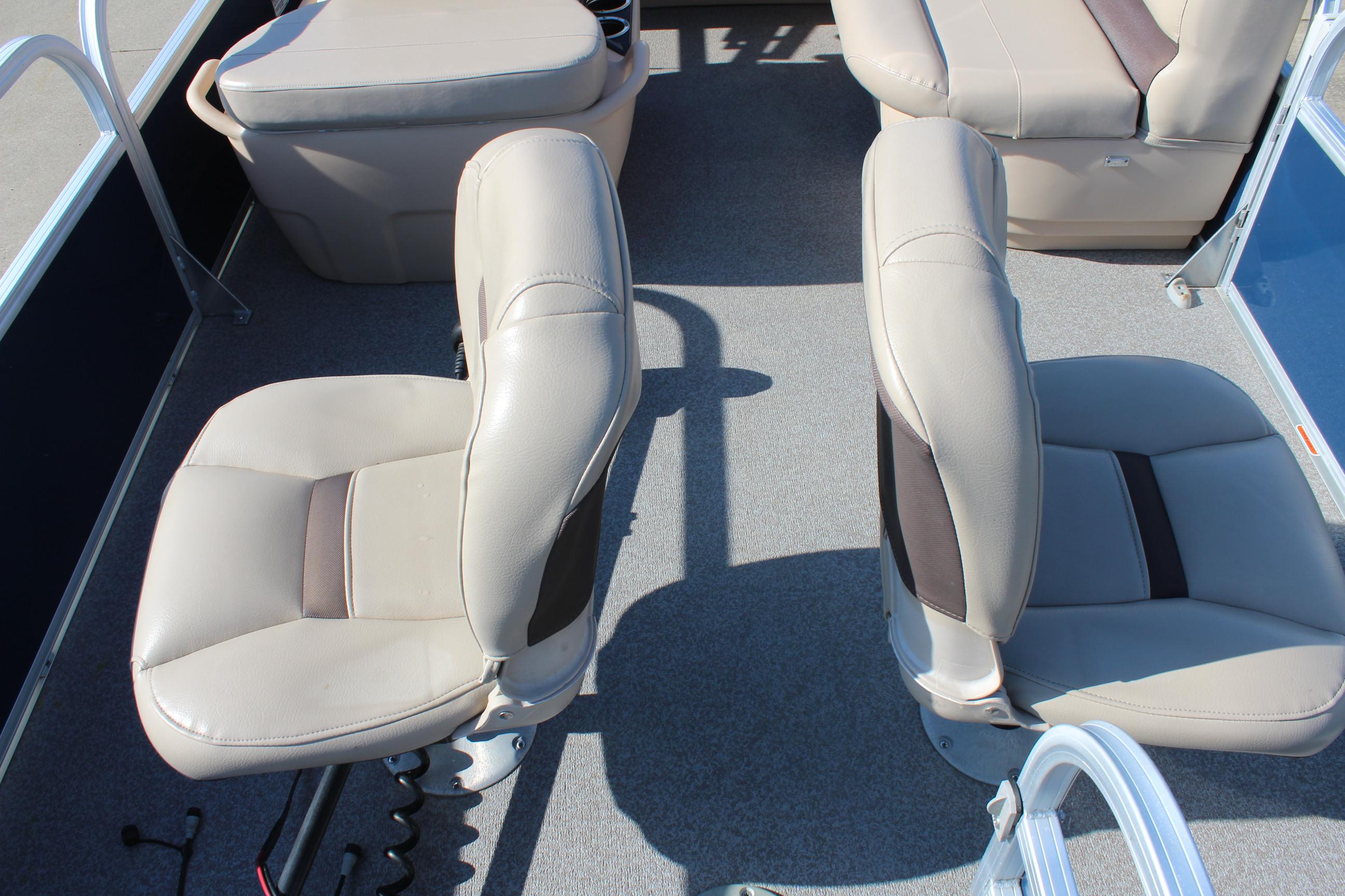 2019 Sun Tracker Bass Buggy 16 XL Select interior with beige seating and carpeted floor.