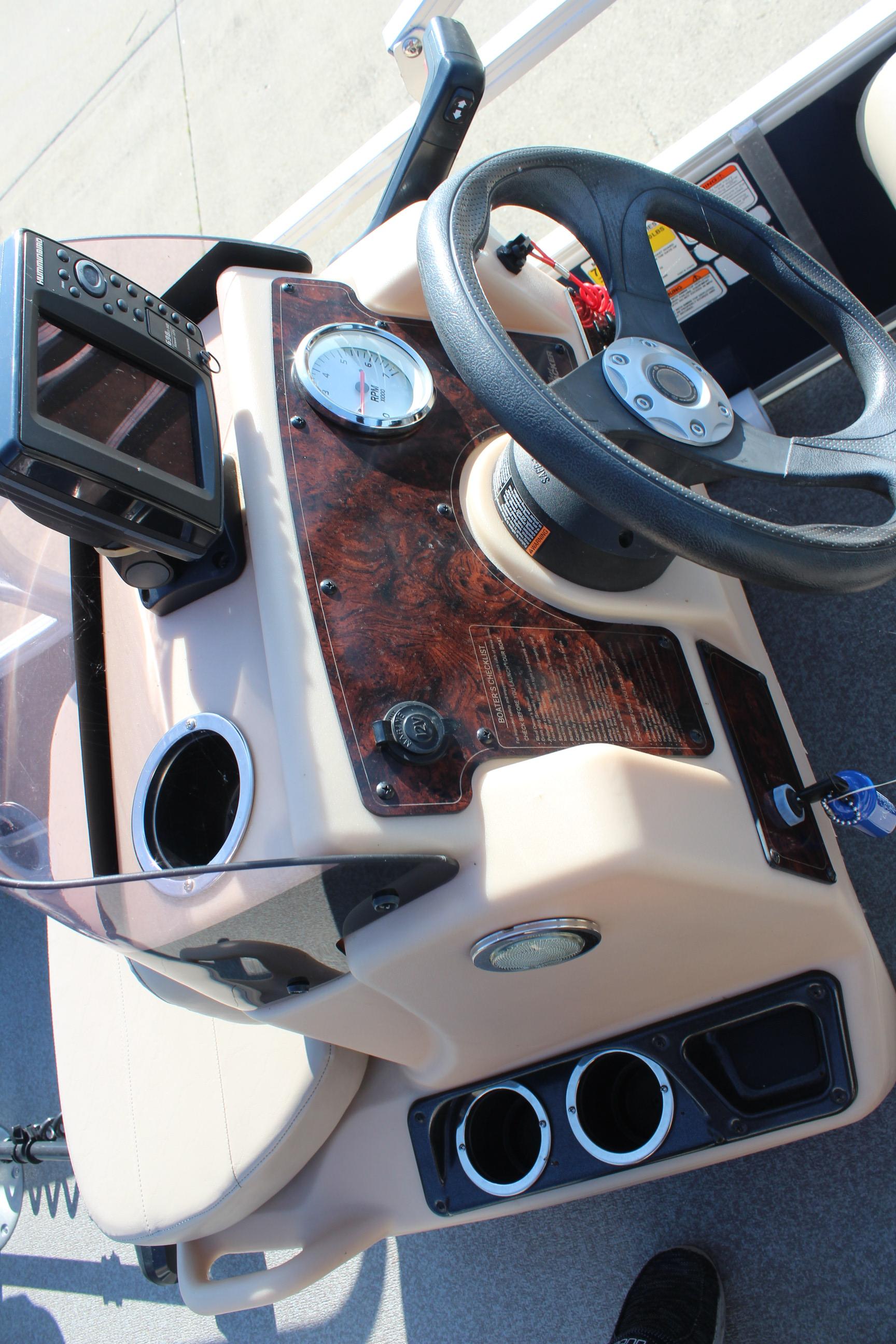 2019 Sun Tracker Bass Buggy 16 XL Select dashboard with steering wheel and controls.