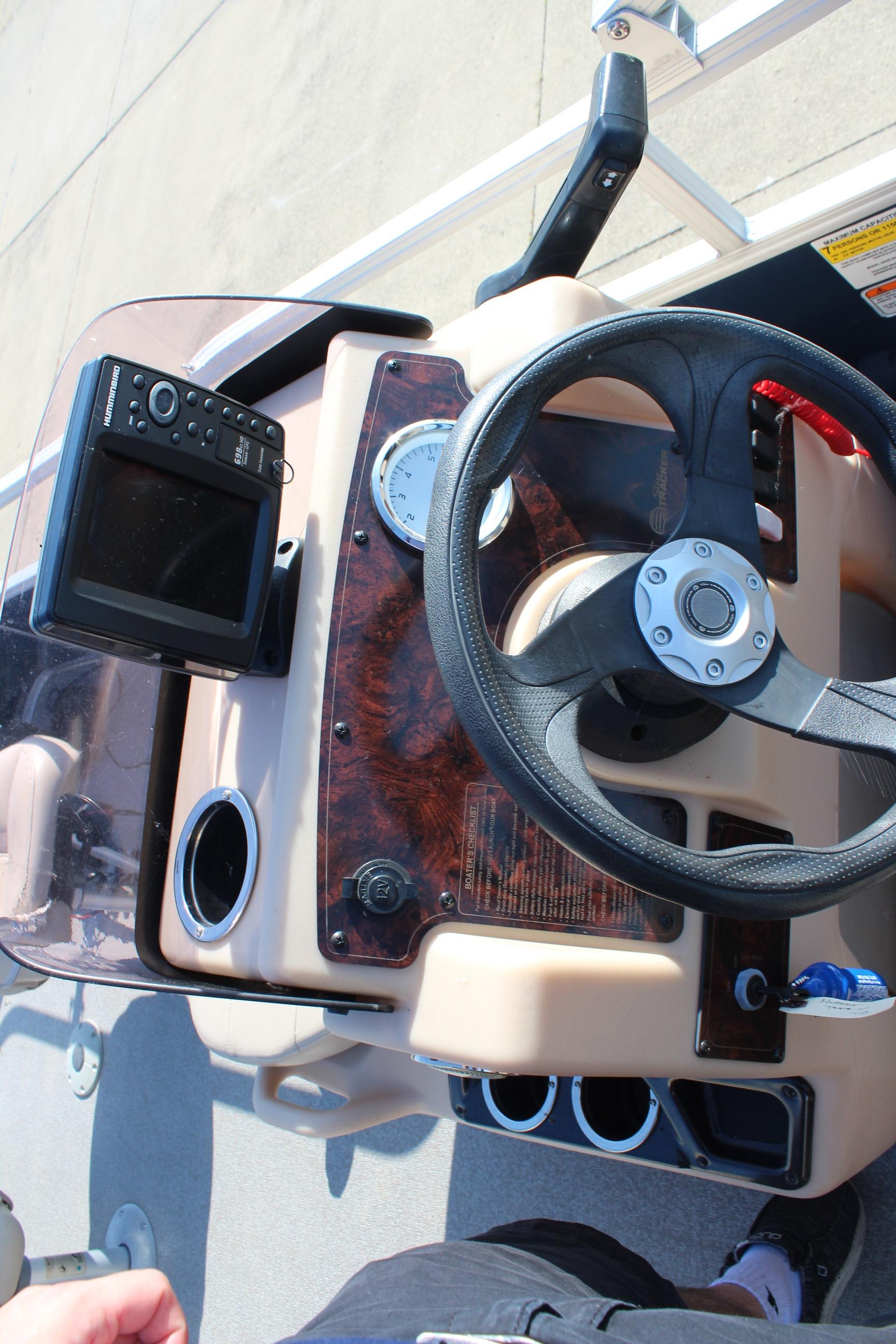 2019 Sun Tracker Bass Buggy 16 XL Select dashboard with steering wheel and control panel.