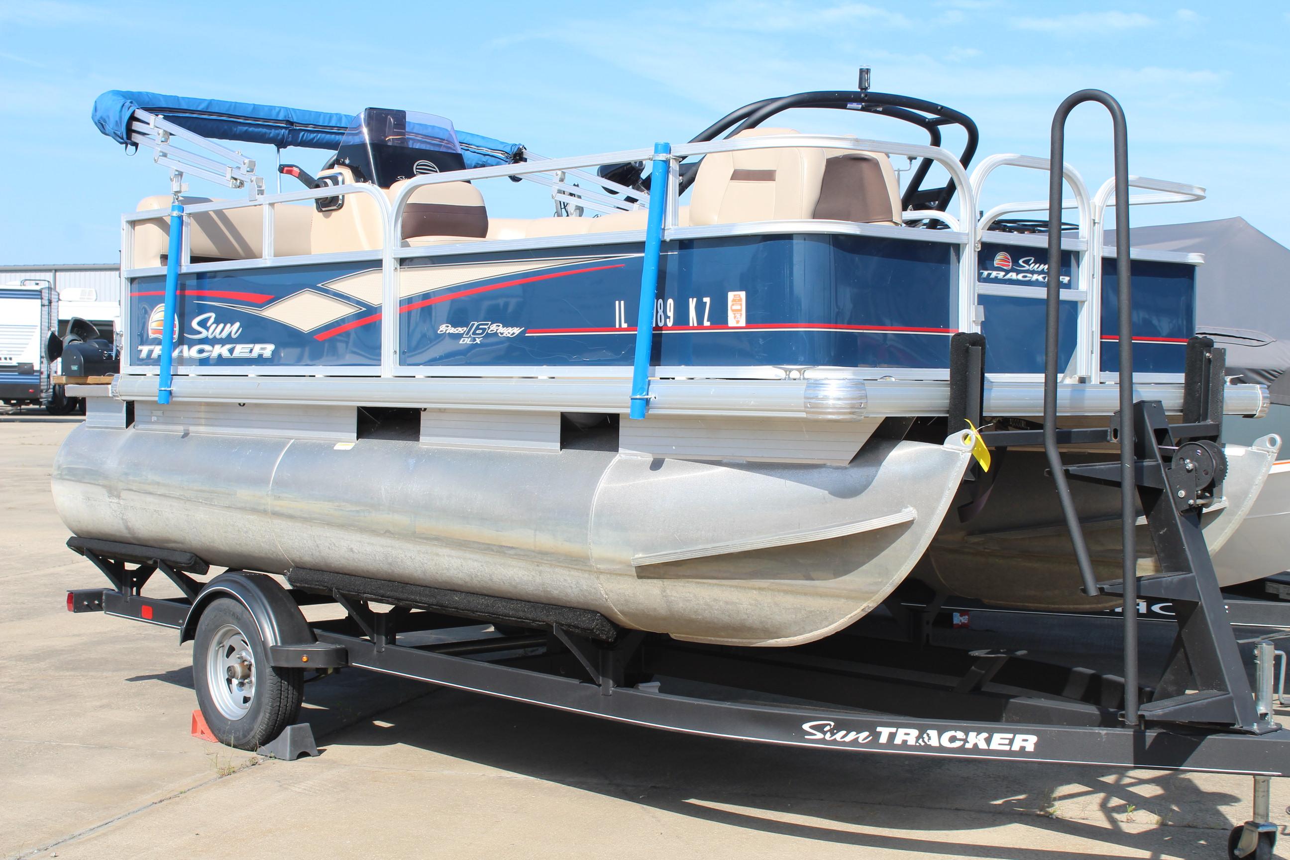 2019 Sun Tracker Bass Buggy 16 XL Select pontoon boat on trailer.