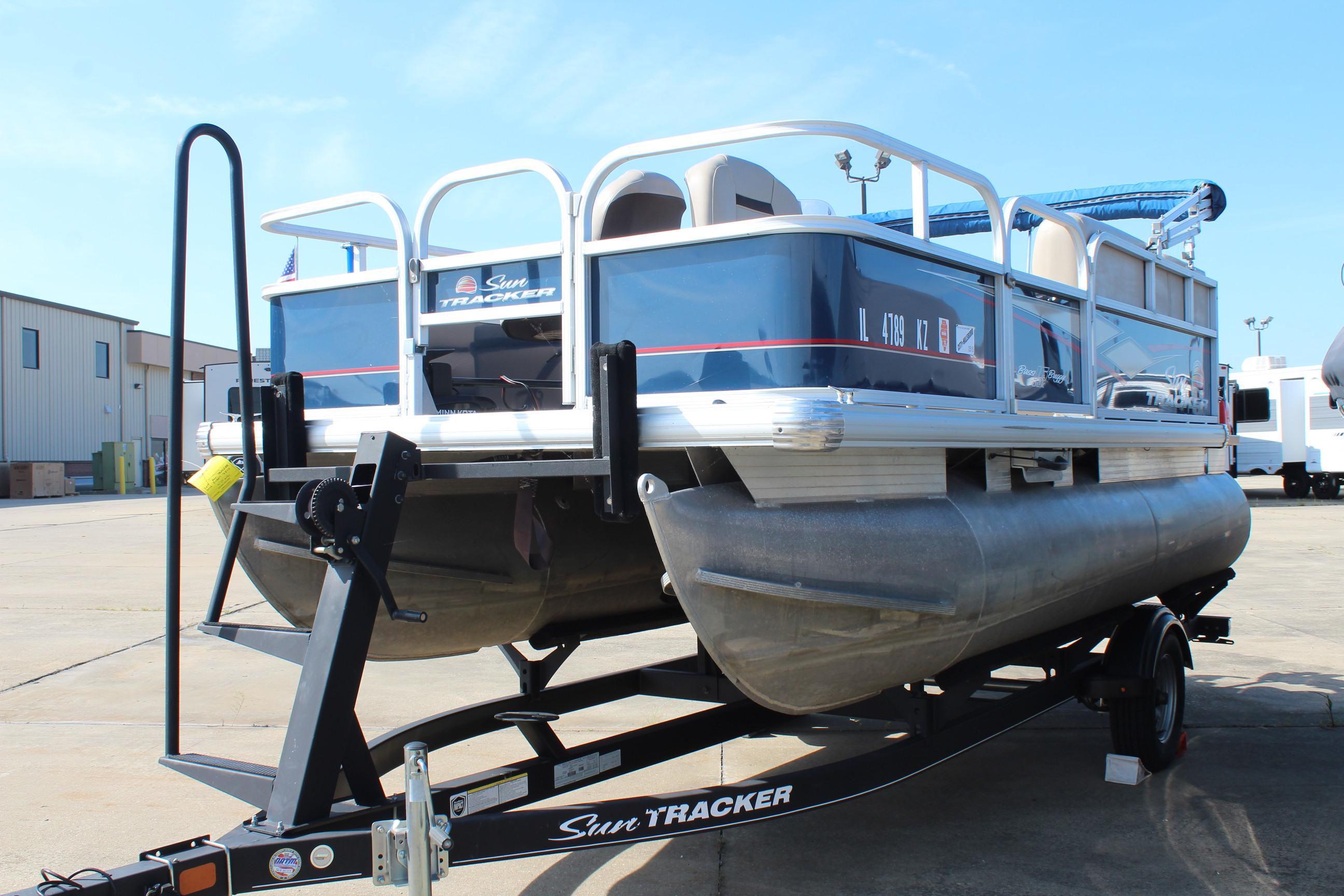 2019 Sun Tracker Bass Buggy 16 XL Select pontoon boat on trailer.