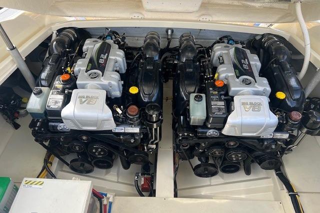 Twin engines of a 2017 Chris-Craft Corsair 32 boat, showcasing powerful V8 blocks.