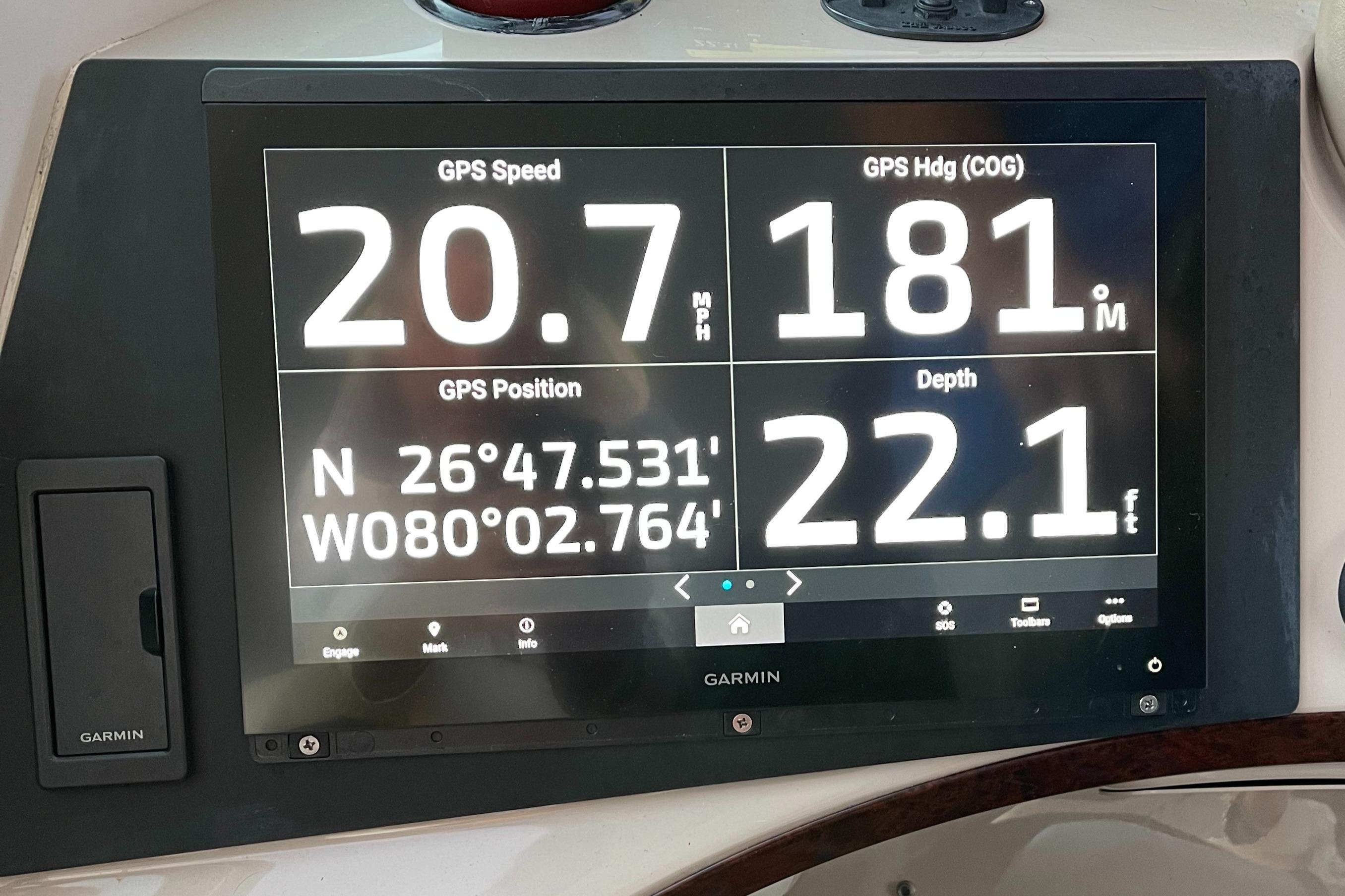 Carver-56 Voyager 2005-Just A Dream FL-US-Garmin GPS display on 2005 Carver 56 Voyager showing speed, heading, position, and depth.-9669425 | Thumbnail