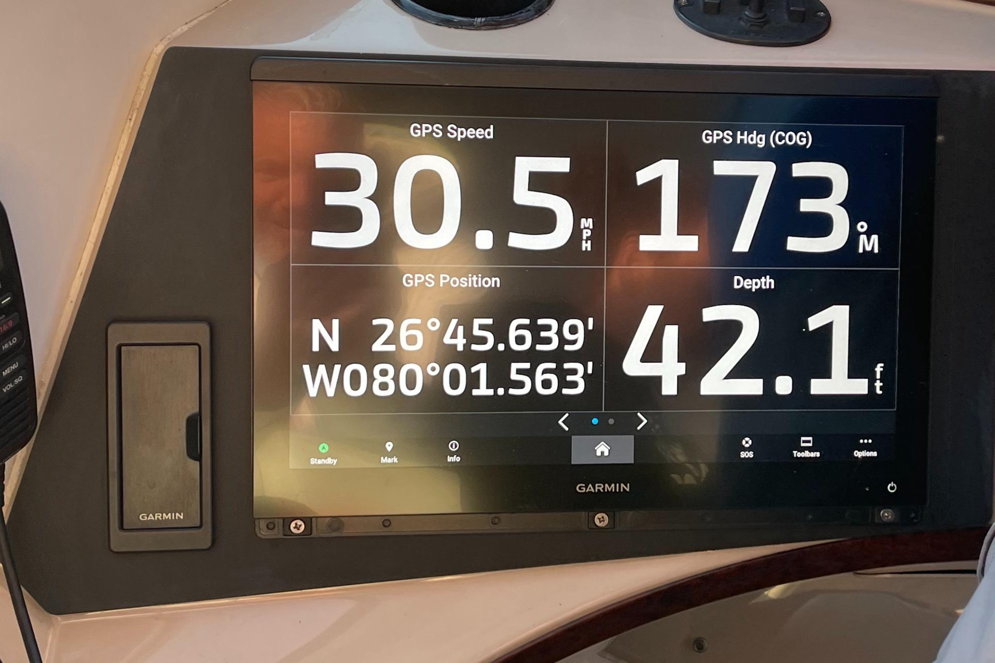 Carver-56 Voyager 2005-Just A Dream FL-US-Garmin GPS display on 2005 Carver 56 Voyager showing speed, heading, position, and depth.-9669425 | Thumbnail