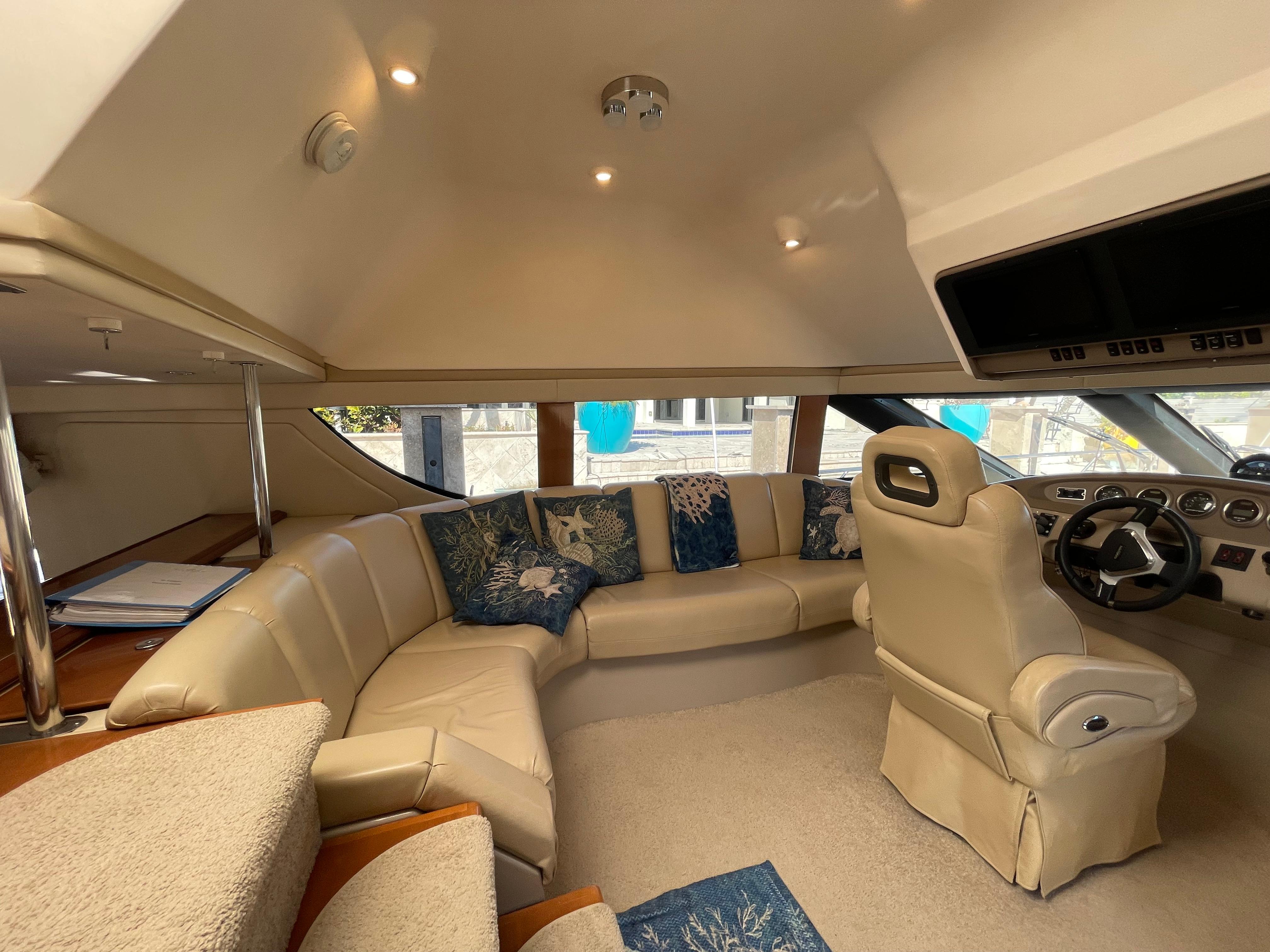 Carver-56 Voyager 2005-Just A Dream FL-US-Luxurious interior of 2005 Carver 56 Voyager yacht with plush seating and modern helm.-9669425 | Thumbnail