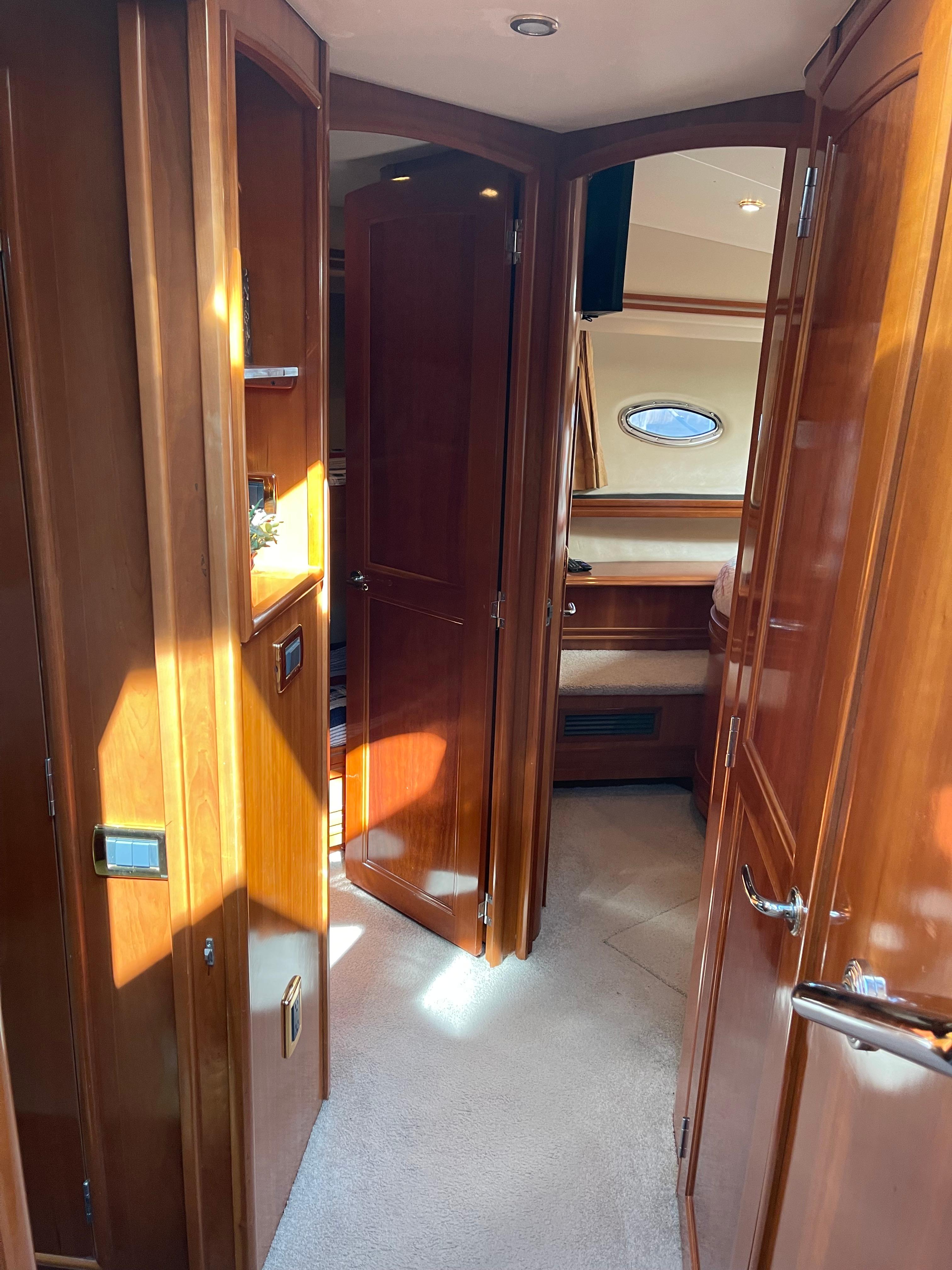 Carver-56 Voyager 2005-Just A Dream FL-US-Interior of 2005 Carver 56 Voyager yacht with wooden cabinetry and carpeted flooring.-9669425 | Thumbnail