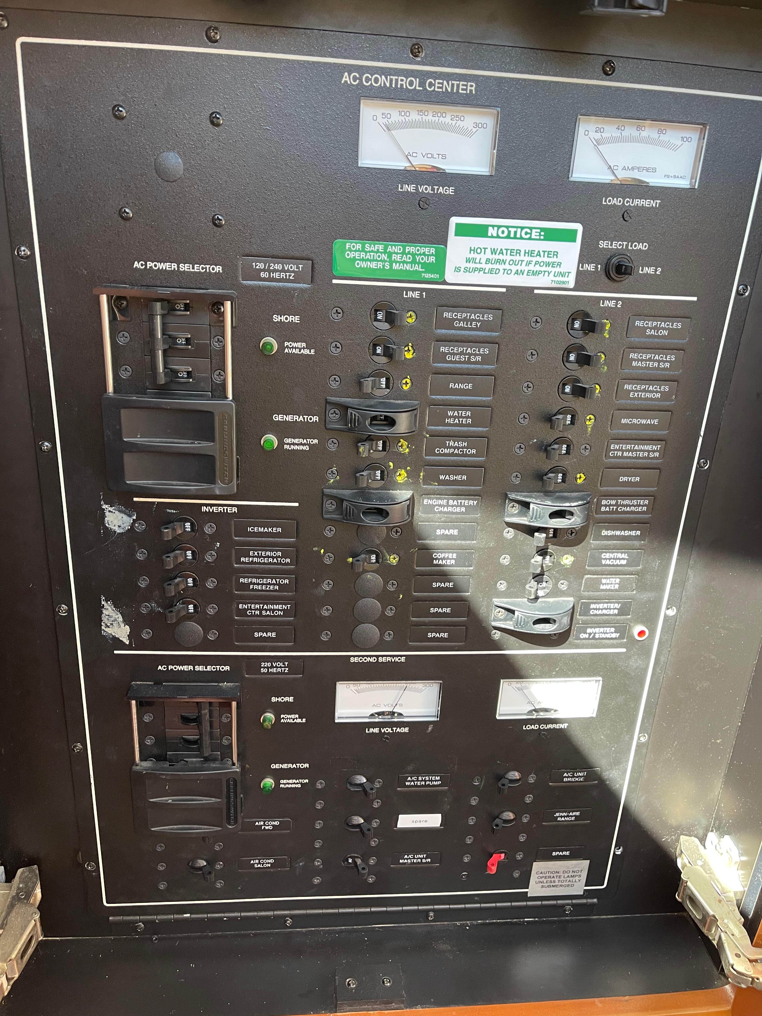 Carver-56 Voyager 2005-Just A Dream FL-US-Control panel of a 2005 Carver 56 Voyager yacht, featuring various switches and indicators.-9669425 | Thumbnail