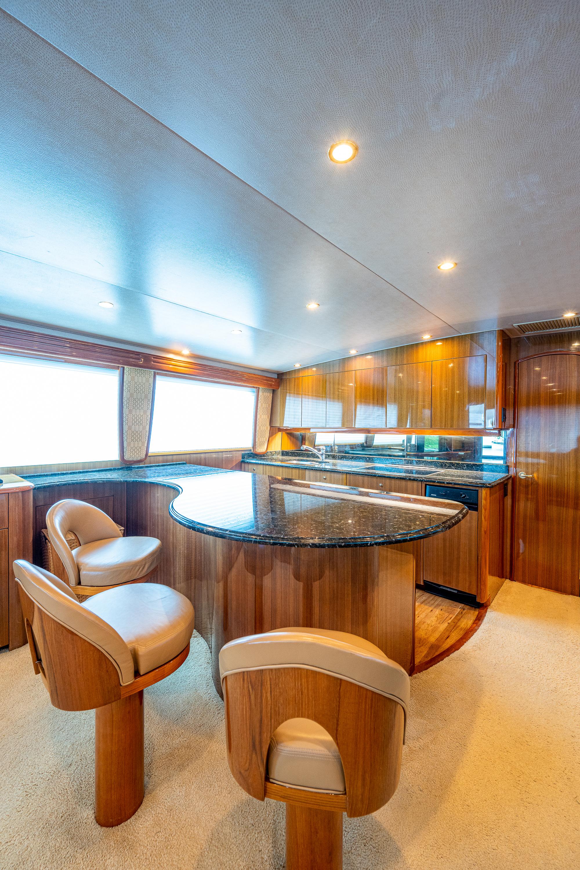 Viking 74 Convertible Reel Estate - Galley, Counter Seating, 3 Couter Height Stools