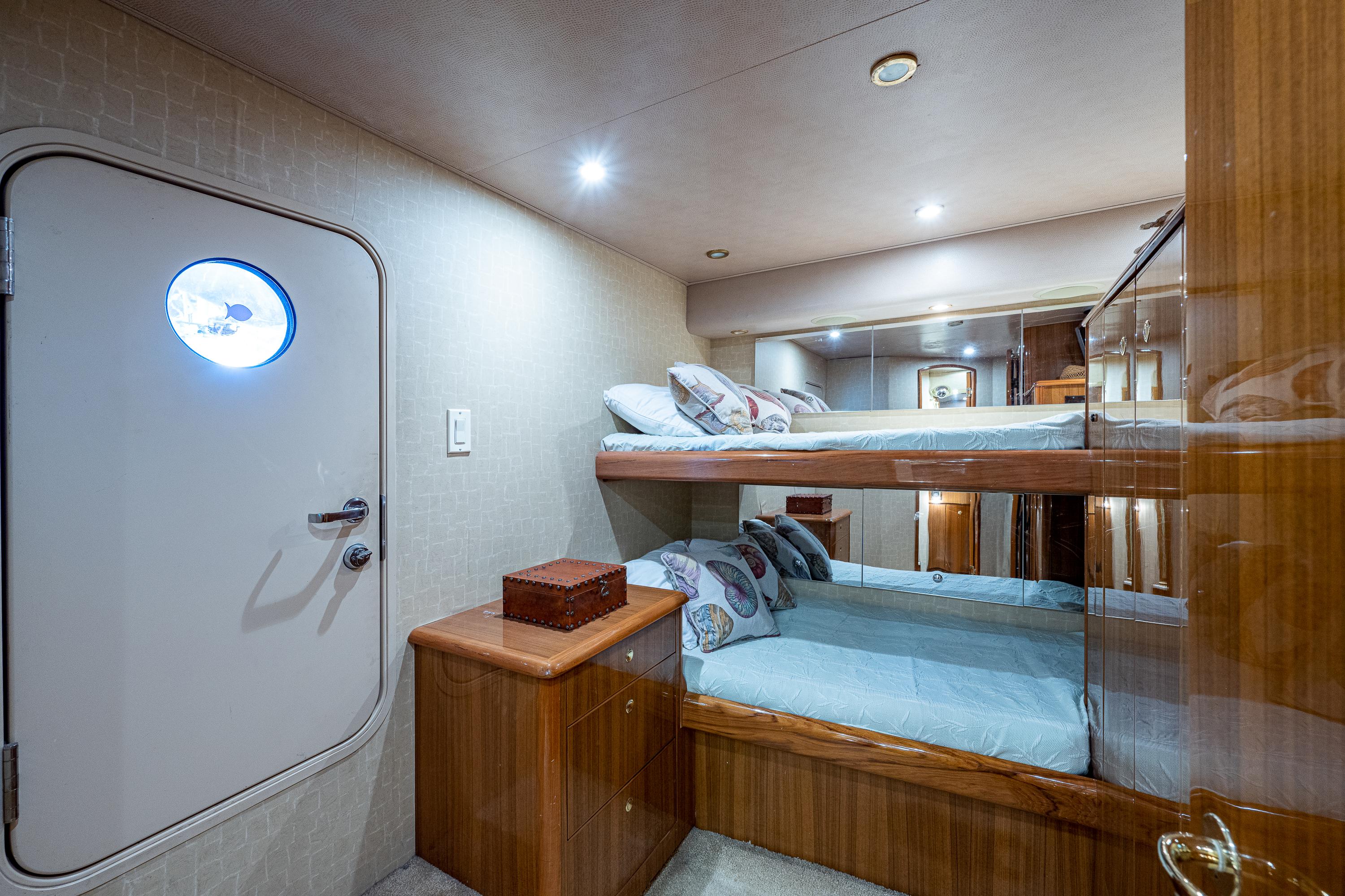 Viking 74 Convertible Reel Estate - Crew Quarters, Upper and Lower Bunks, Engine Room Access Door