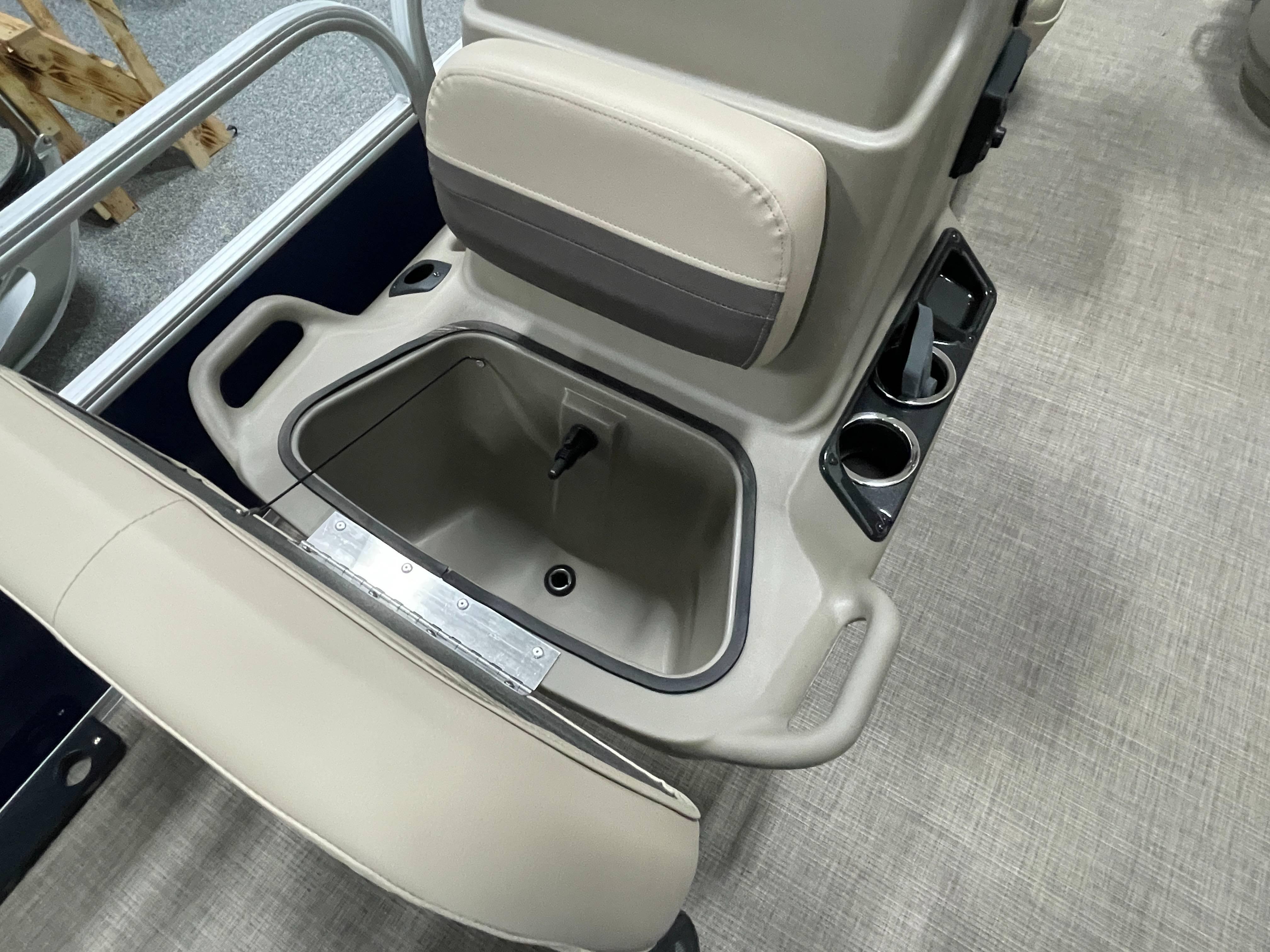 2025 Sun Tracker Bass Buggy 16 XL Select boat seat with storage compartment and cup holders.