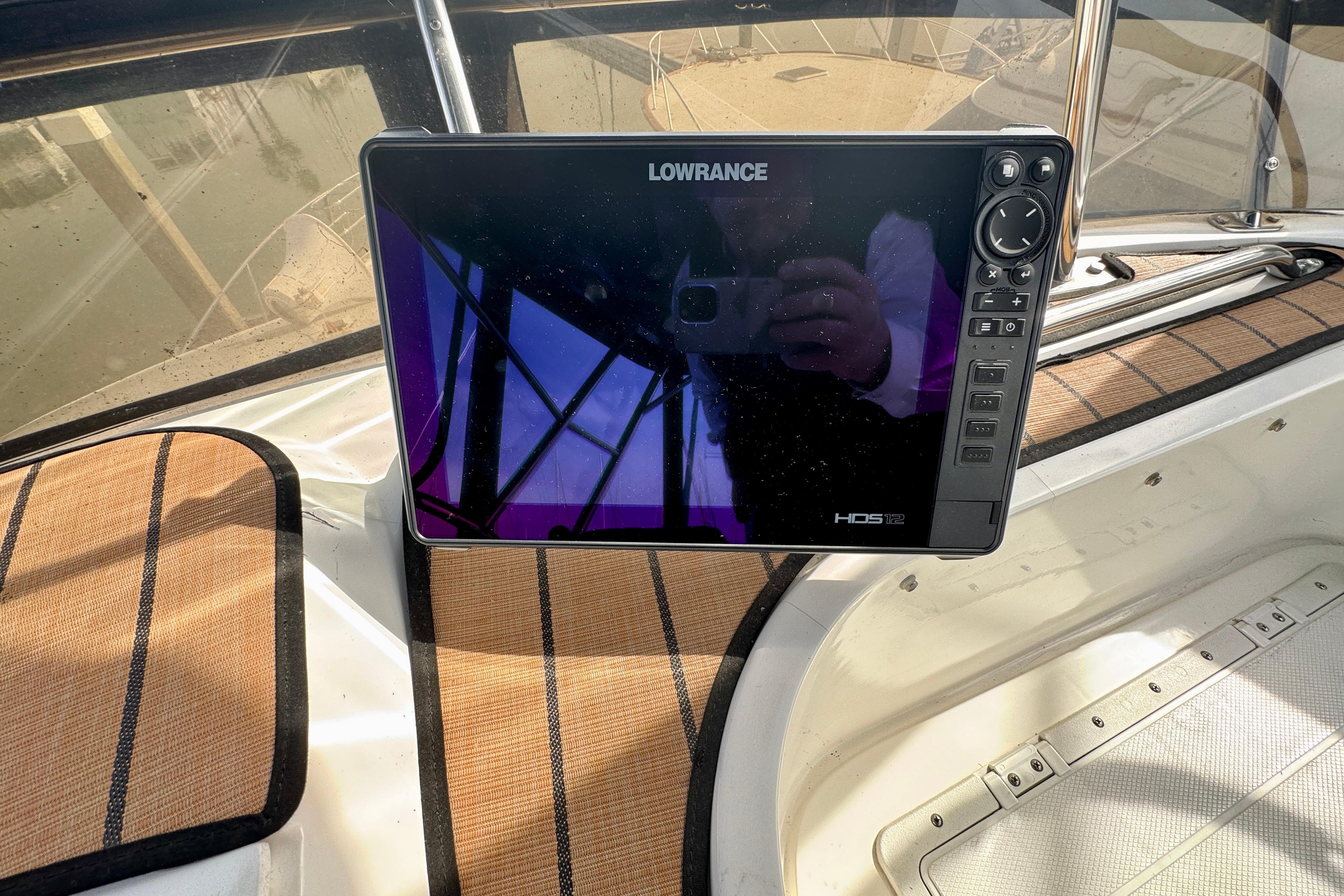 Lowrance HDS-12 display on 1989 Mediterranean 38 boat dashboard.