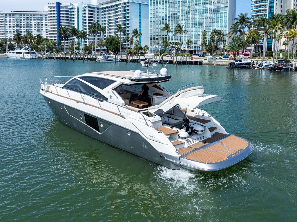 Cranchi-56 HT 2014-Minion FL-US-Luxury 2014 Cranchi 56 HT yacht cruising in a scenic waterfront setting.-9819548 | Thumbnail