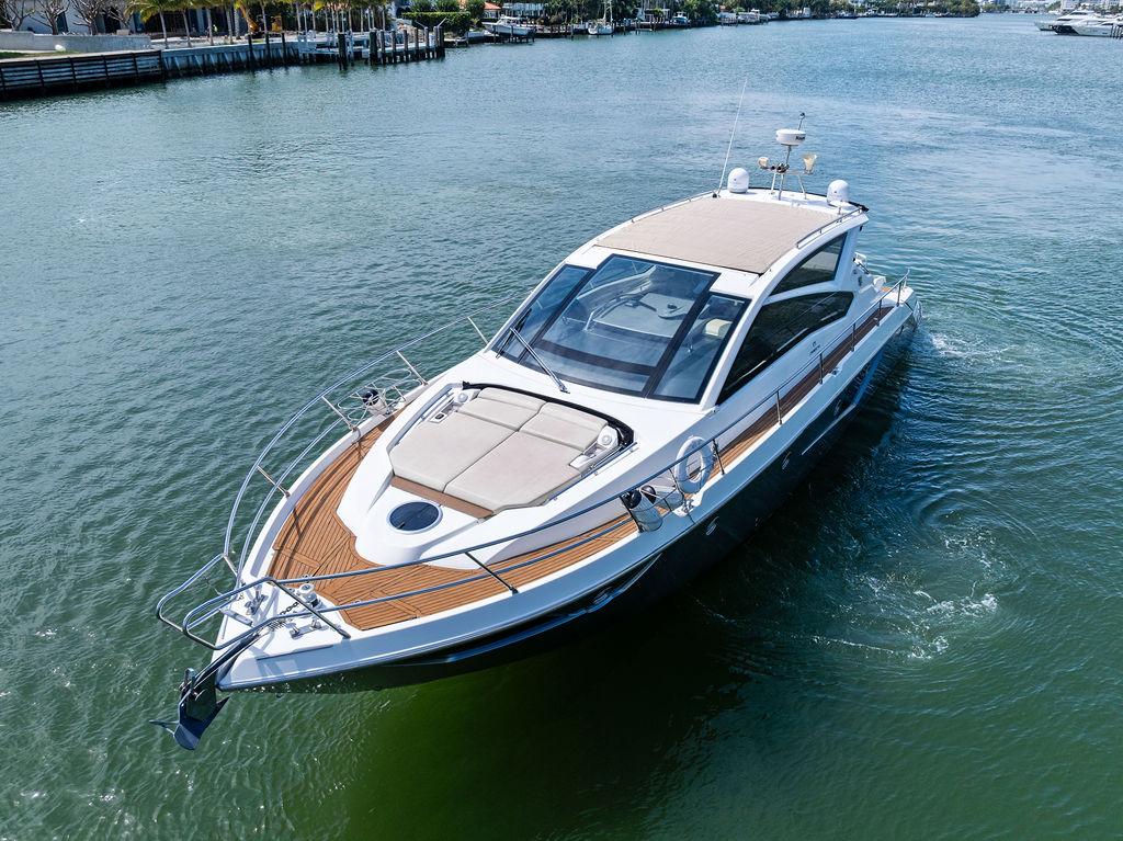 Cranchi-56 HT 2014-Minion FL-US-2014 Cranchi 56 HT yacht cruising on calm waters, showcasing sleek design and luxury features.-9819548 | Thumbnail
