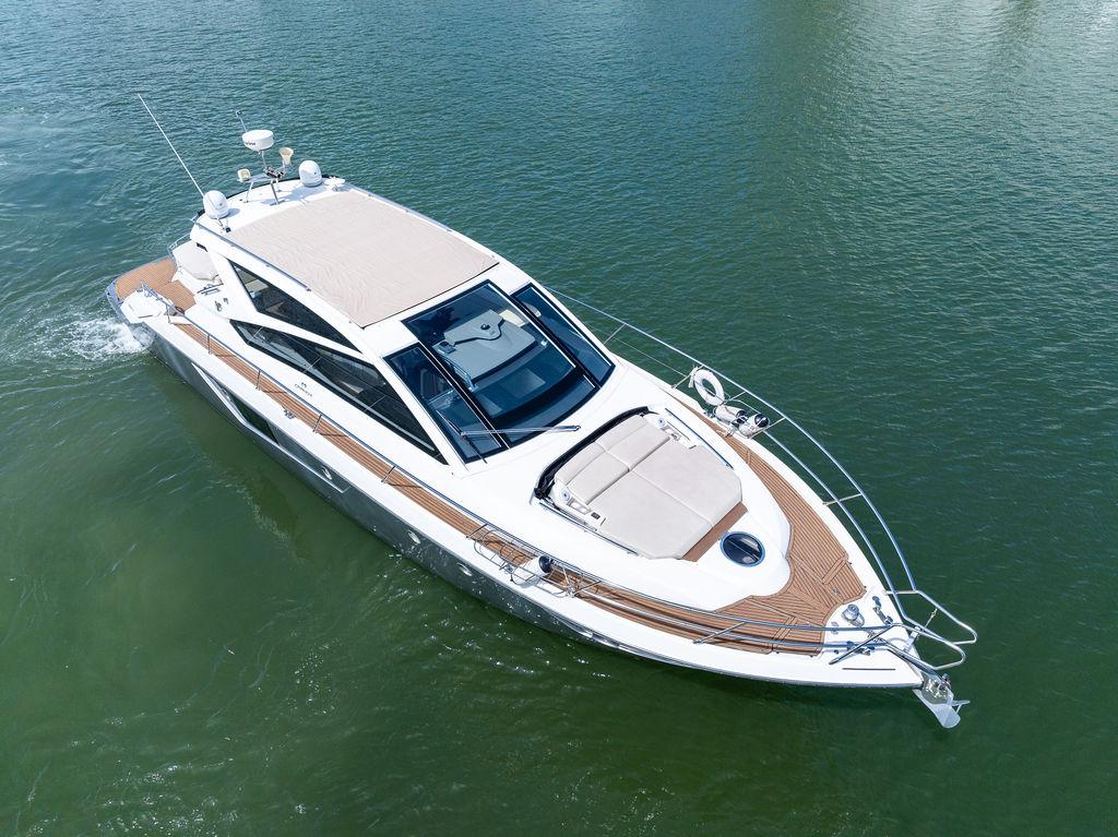 Cranchi-56 HT 2014-Minion FL-US-2014 Cranchi 56 HT yacht cruising on calm waters, showcasing sleek design and luxury features.-9819548 | Thumbnail