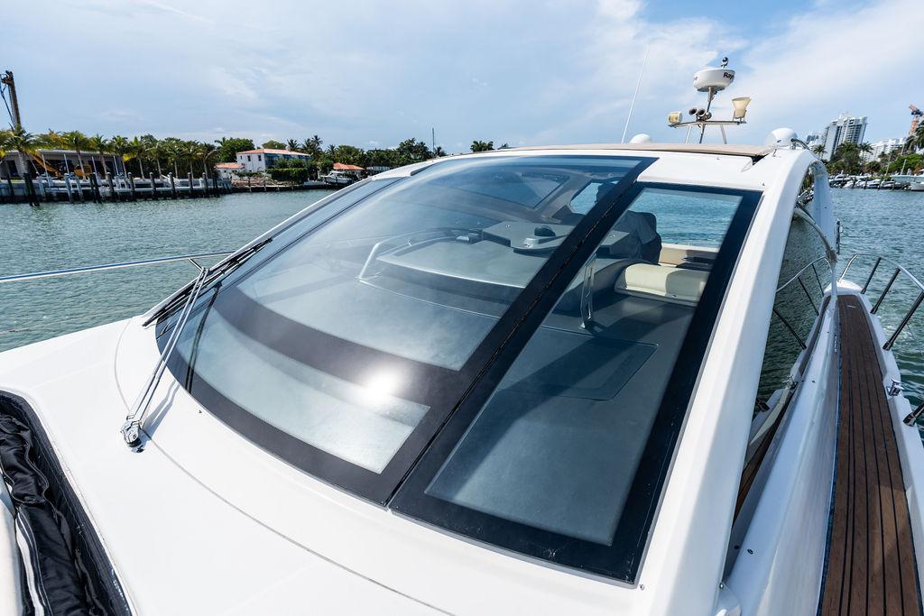Cranchi-56 HT 2014-Minion FL-US-2014 Cranchi 56 HT yacht with sleek design, docked by waterfront homes.-9819548 | Thumbnail
