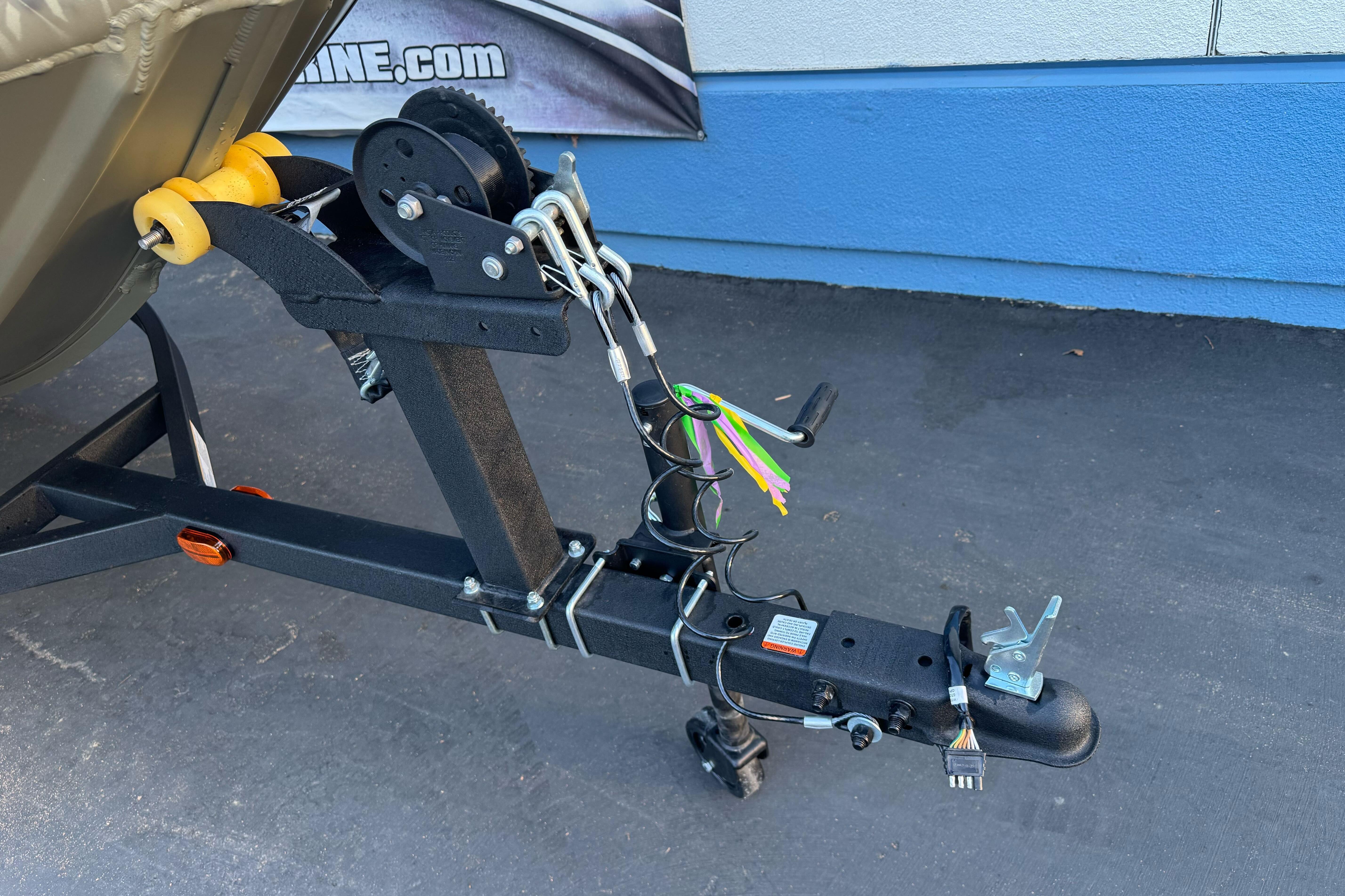 Trailer hitch of 2026 Tracker Grizzly 1650 T Prairie Wings Edition, featuring winch and wiring.