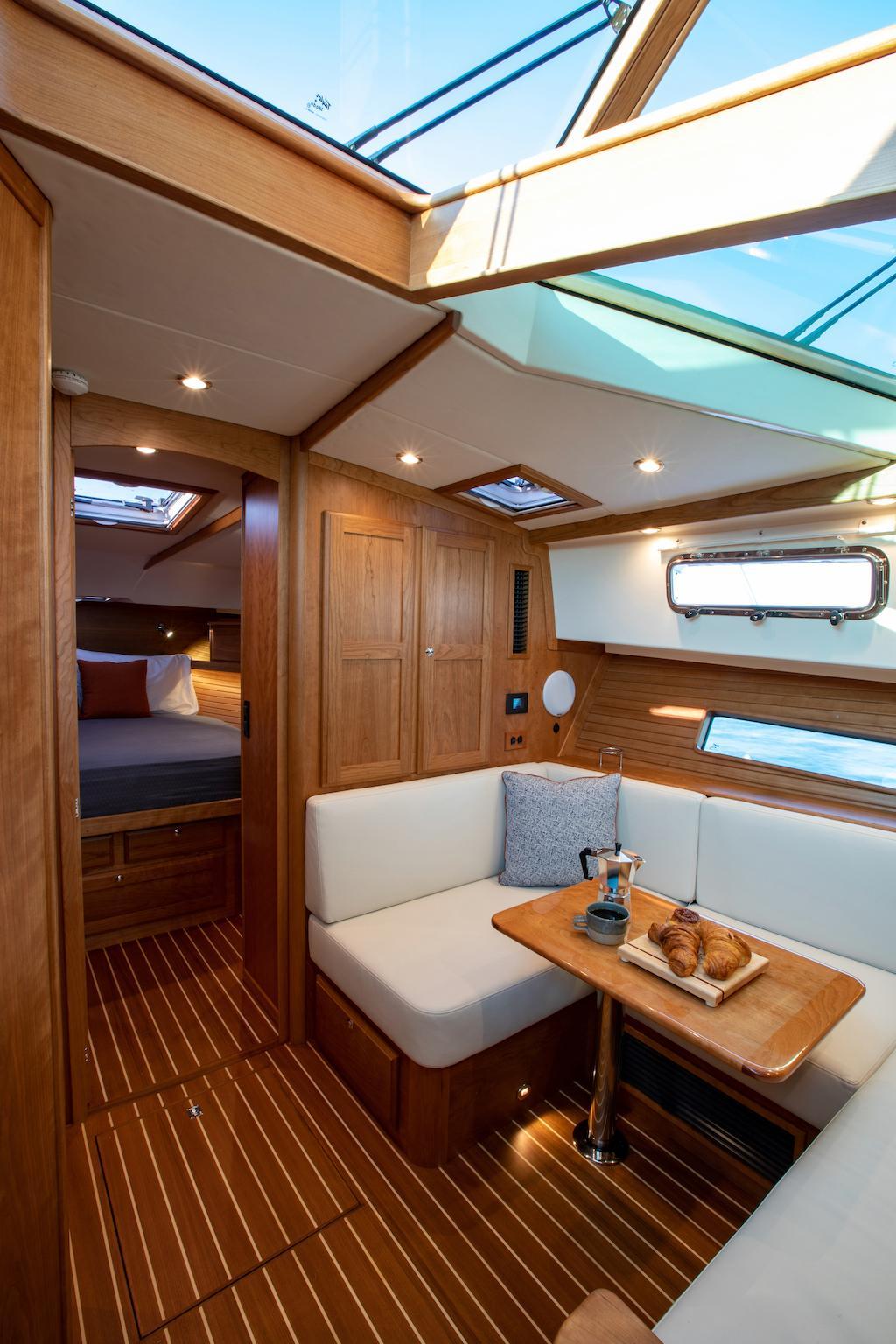 Luxurious interior of 2026 Sabre 43 Salon Express yacht with elegant wood finish.