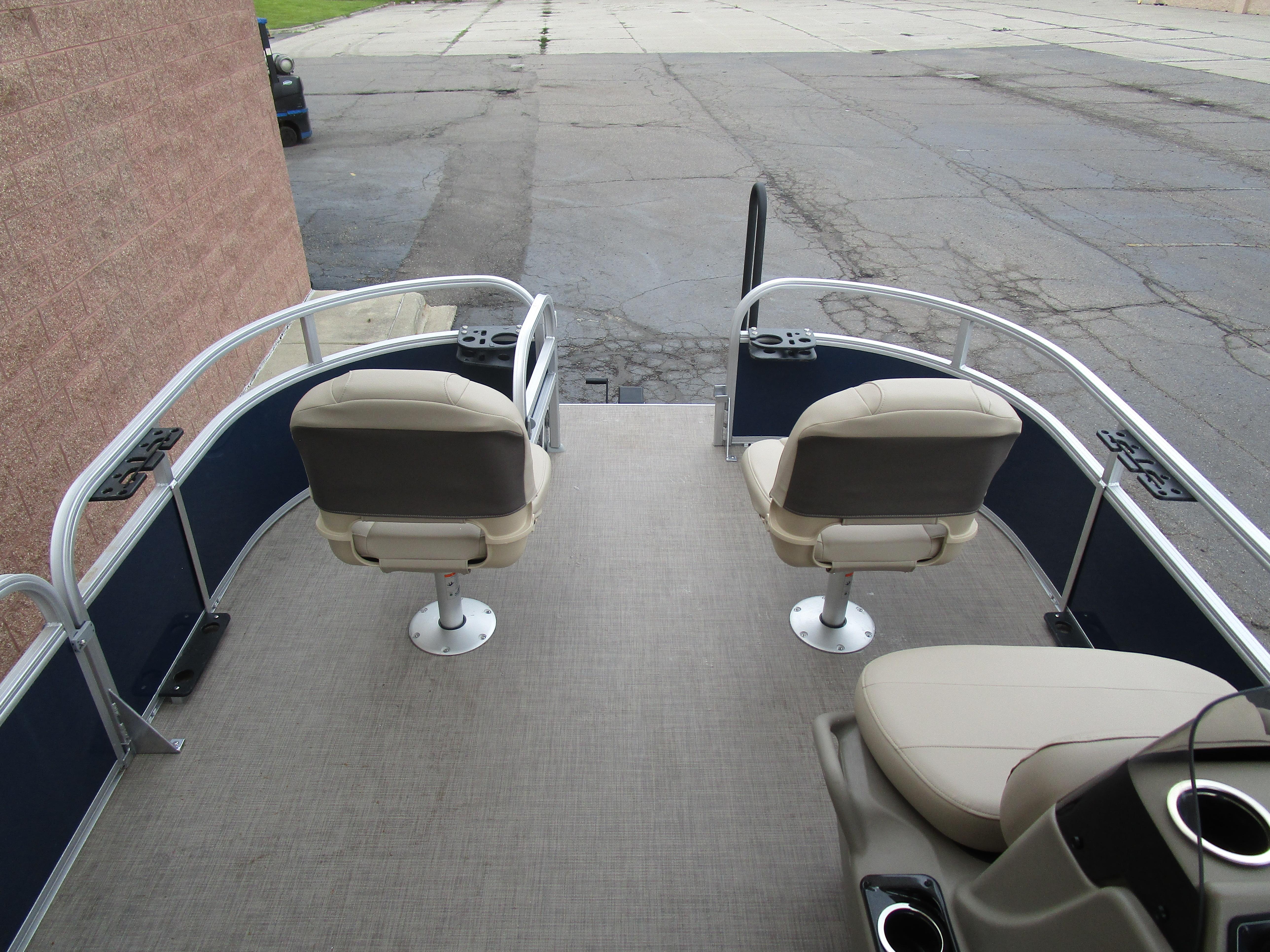 2025 Sun Tracker Bass Buggy 16 pontoon boat with dual swivel seats and spacious deck.