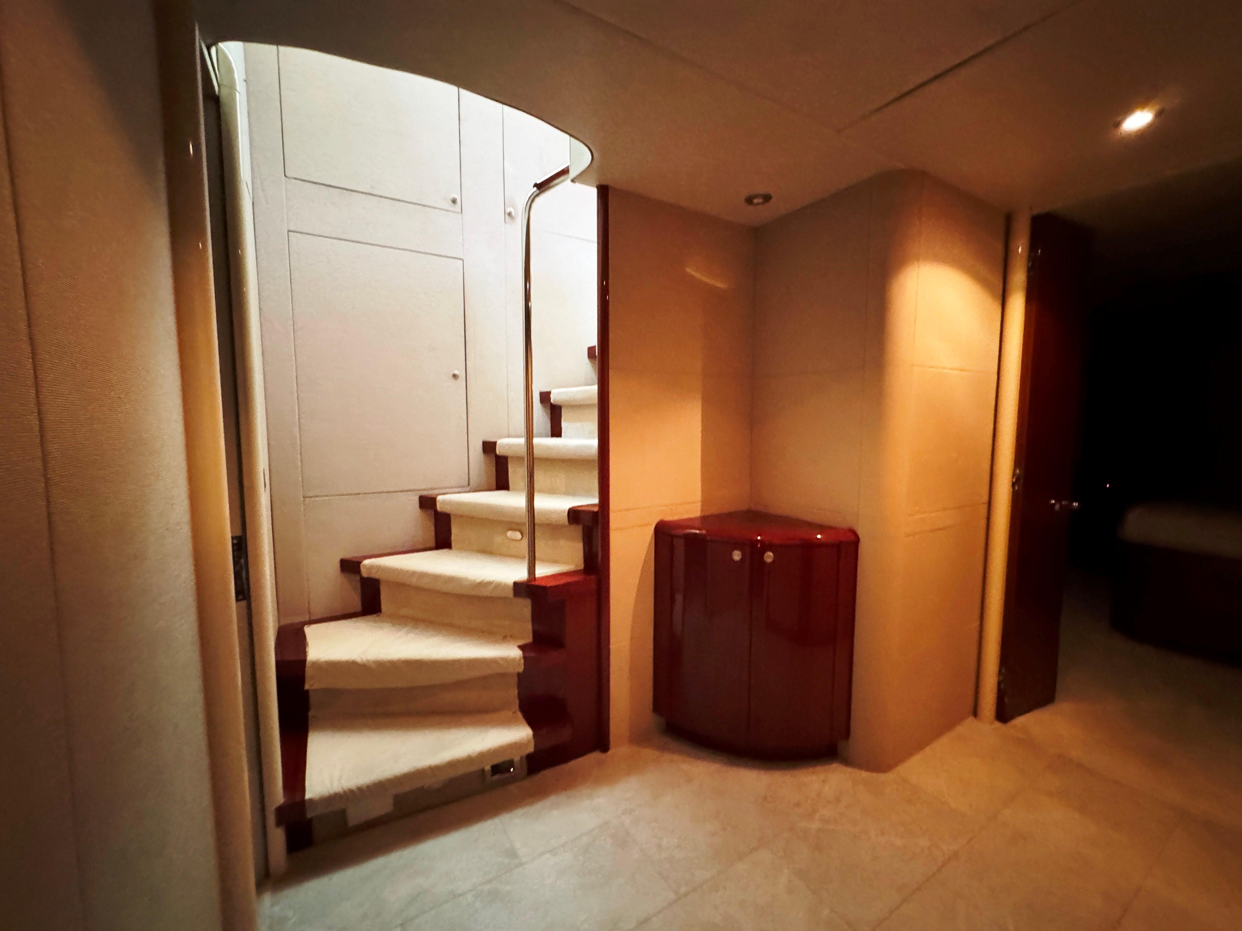 Lazzara-80 Skylounge 2002-Fomo2 FL-US-Interior of 2002 Lazzara 80 Skylounge yacht with elegant staircase and modern design.-9749638 | Thumbnail