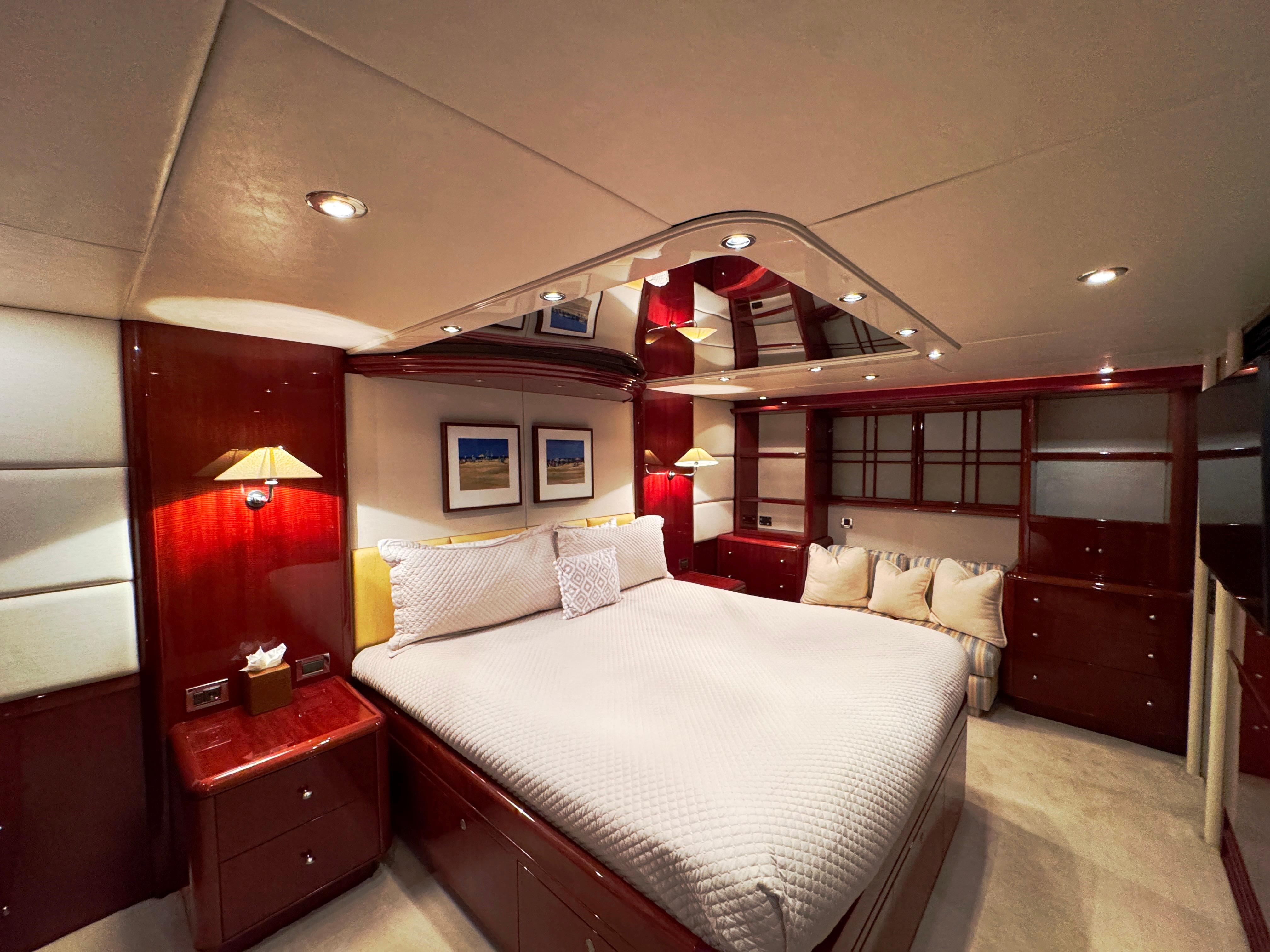 Lazzara-80 Skylounge 2002-Fomo2 FL-US-Luxurious bedroom interior of 2002 Lazzara 80 Skylounge yacht with elegant wood finishes.-9749638 | Thumbnail