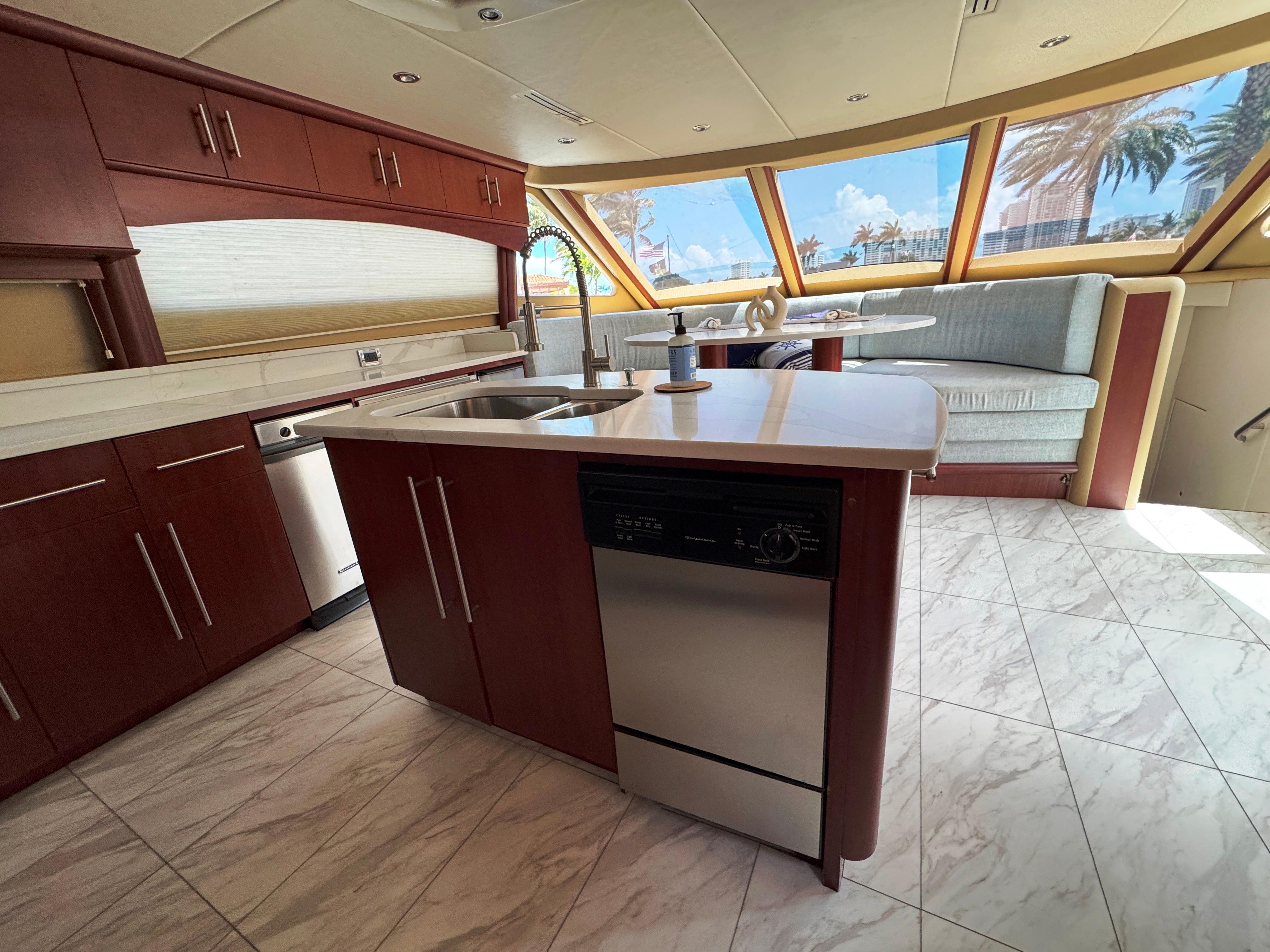 Lazzara-80 Skylounge 2002-Fomo2 FL-US-Luxurious kitchen interior of 2002 Lazzara 80 Skylounge yacht with modern appliances.-9749638 | Thumbnail
