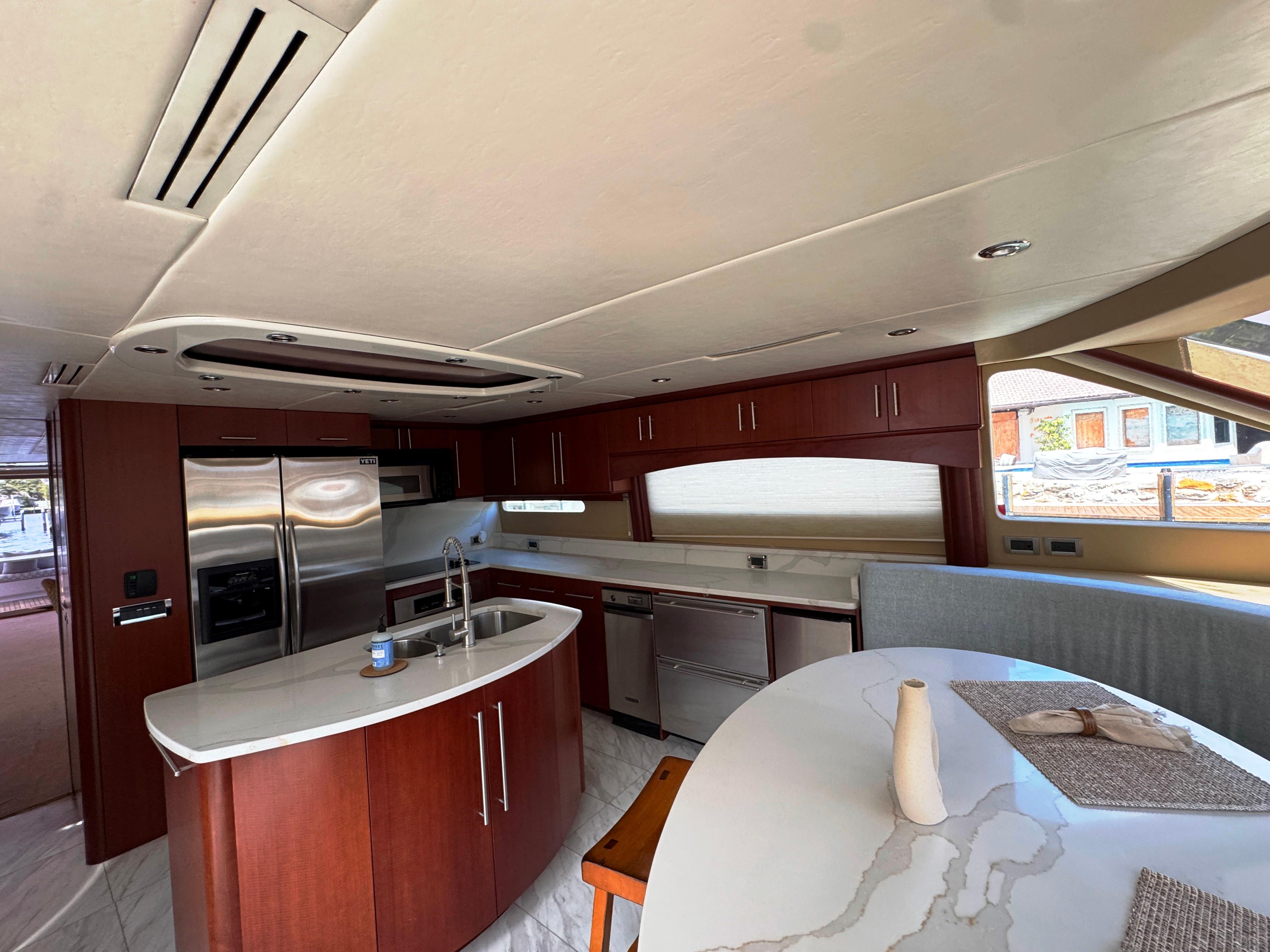 Lazzara-80 Skylounge 2002-Fomo2 FL-US-Luxurious kitchen interior of 2002 Lazzara 80 Skylounge yacht with modern appliances.-9749638 | Thumbnail