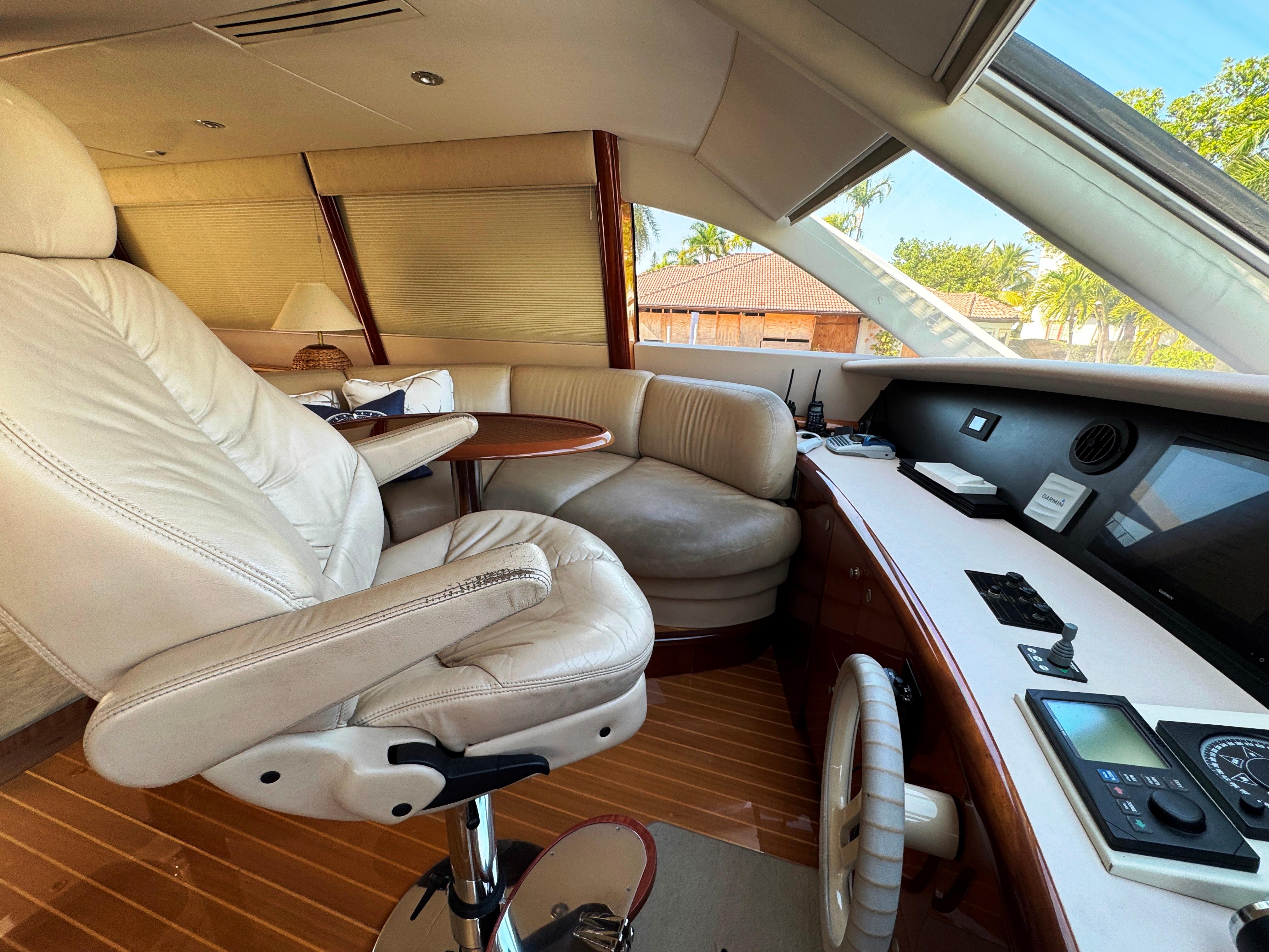 Lazzara-80 Skylounge 2002-Fomo2 FL-US-Luxurious interior of 2002 Lazzara 80 Skylounge yacht with plush seating and modern controls.-9749638 | Thumbnail