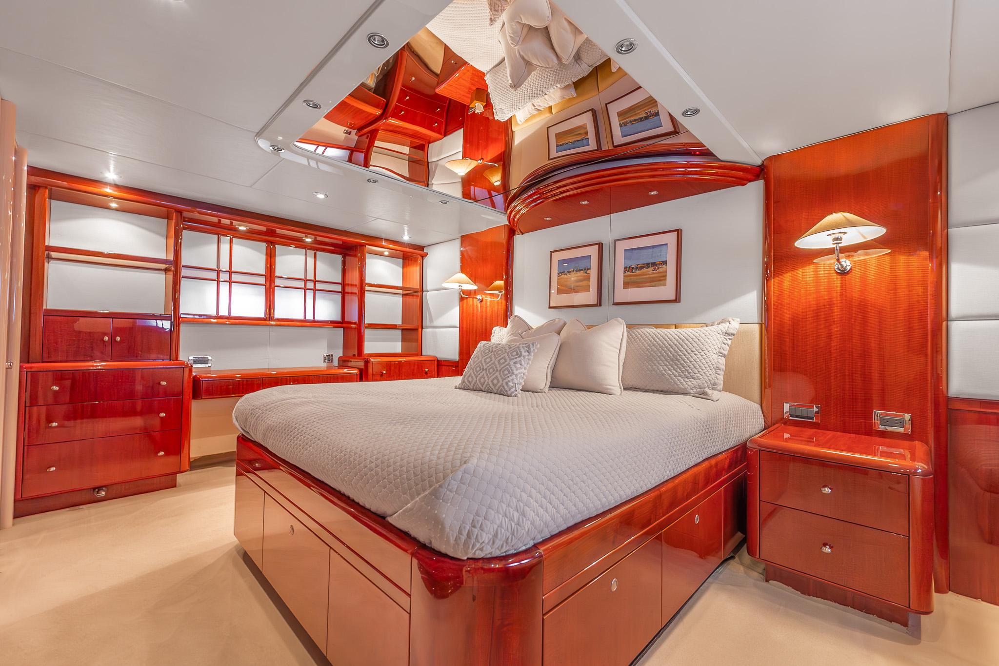 Lazzara-80 Skylounge 2002-Fomo2 FL-US-Luxurious bedroom interior of 2002 Lazzara 80 Skylounge yacht with elegant wood finishes.-9749638 | Thumbnail