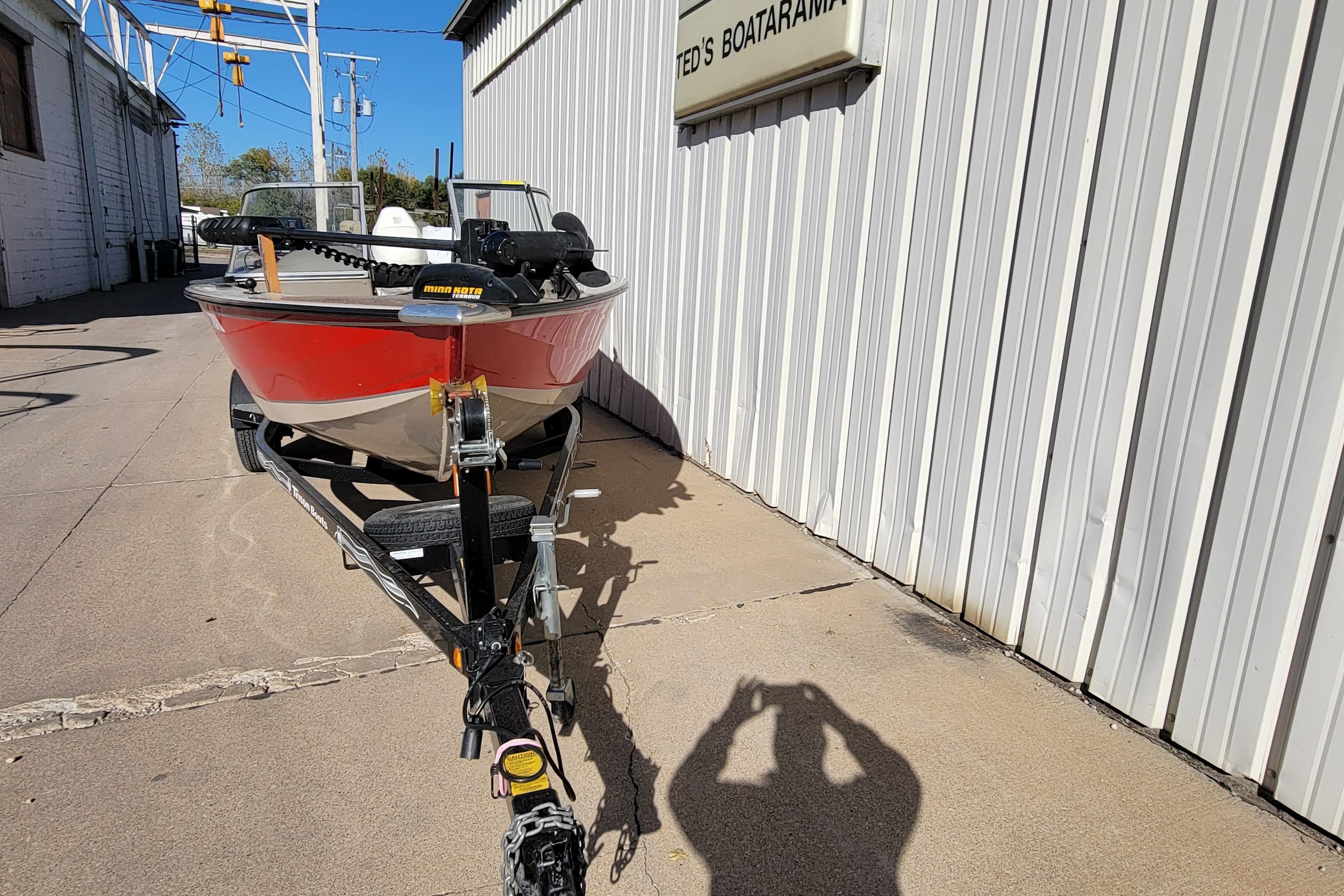 2007 Triton DV 176 Mag boat on trailer outside Ted's Boatarama.