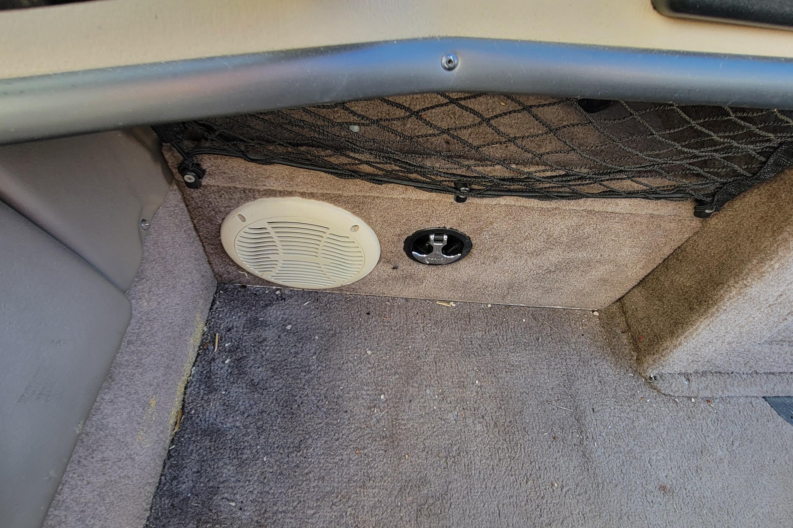 2007 Triton DV 176 Mag interior with speaker and storage net.