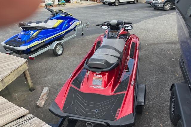 2019 Yamaha WaveRunner VX Limited in red, parked on a trailer in a lot.