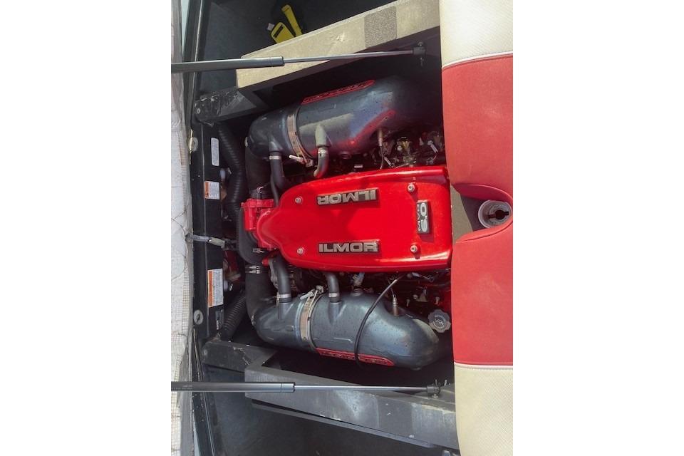 2013 MasterCraft X-25 engine with red Ilmor cover, top view.