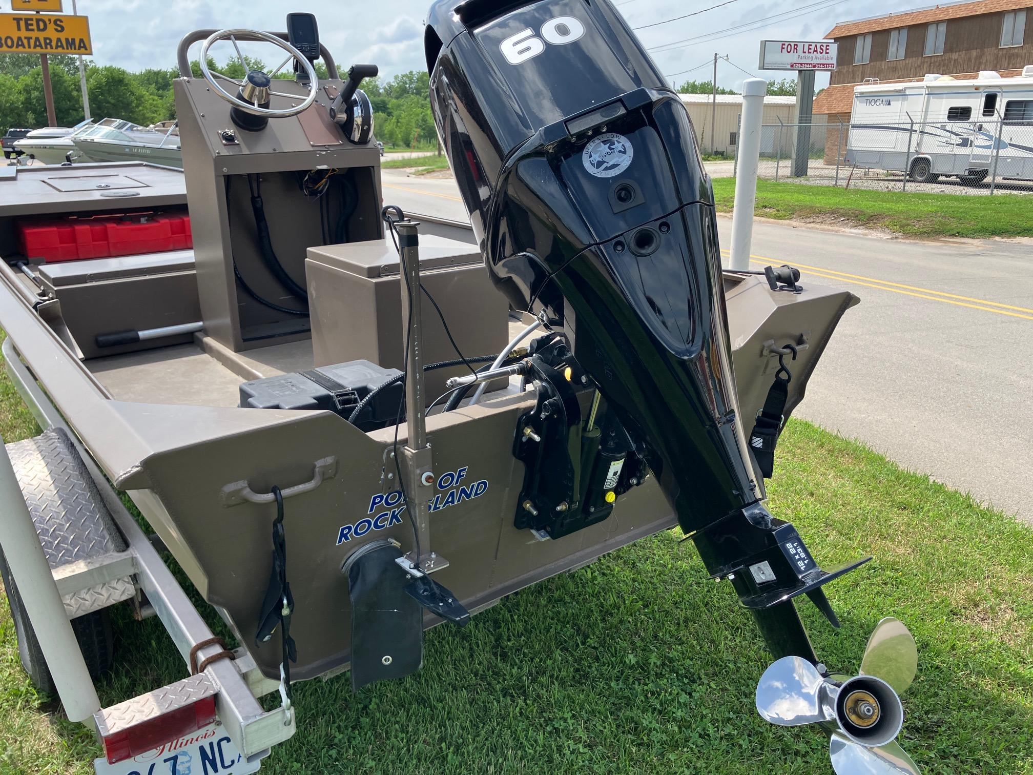 2017 Pro-Drive SBX Series 18' boat with 60 HP outboard motor on trailer.