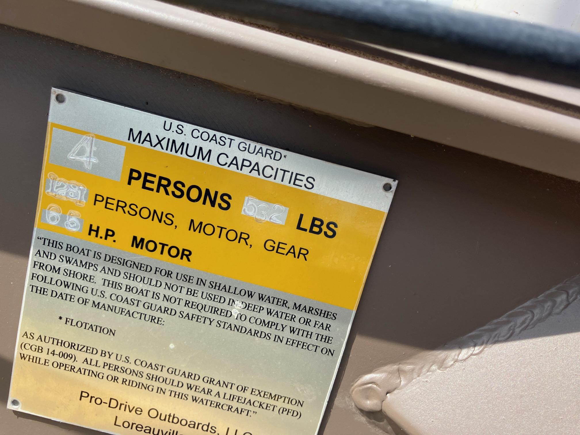 2017 Pro-Drive SBX Series 18' boat capacity plate, showing maximum persons and weight limits.