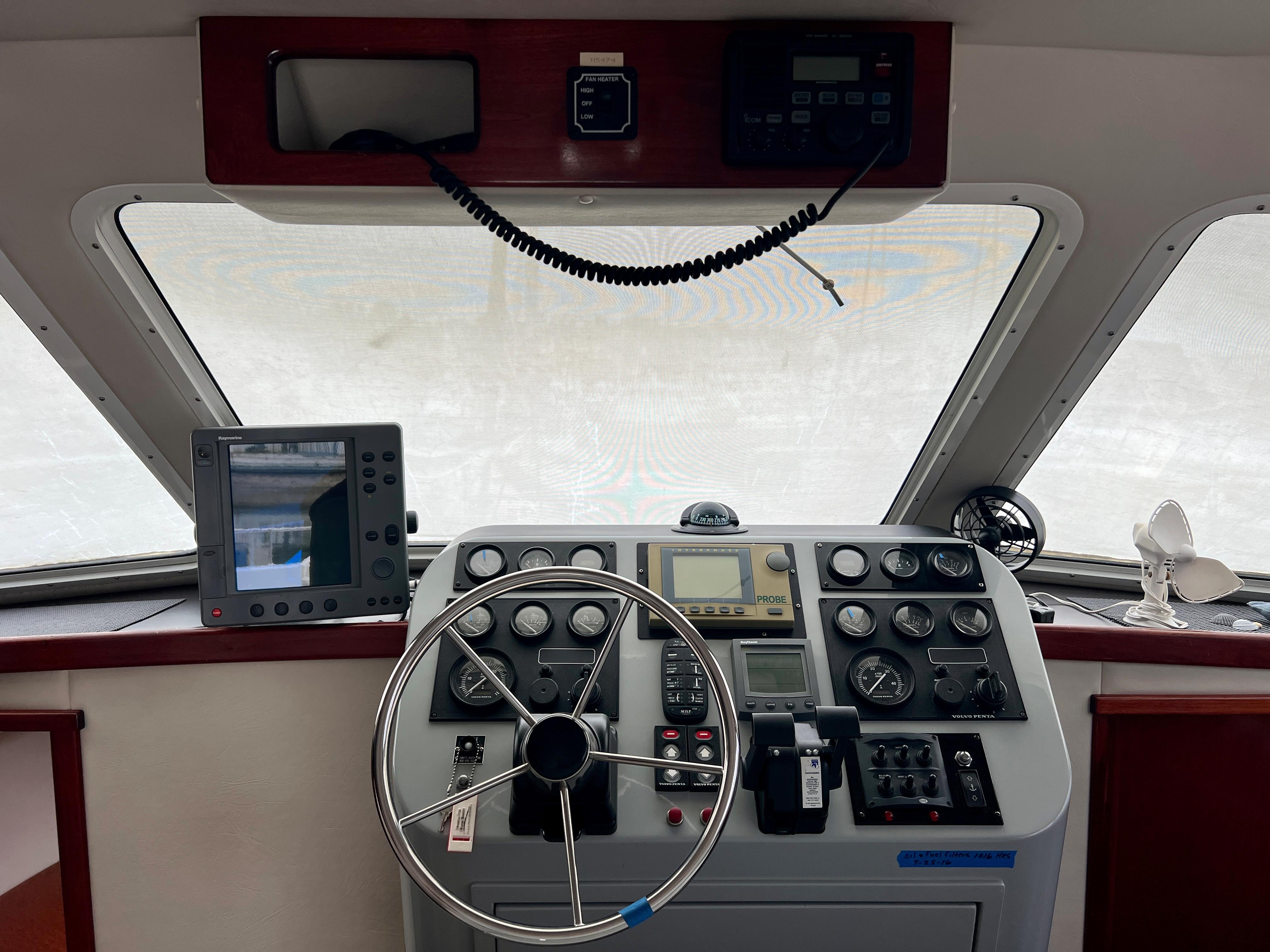 Helm with electronics and engine controls