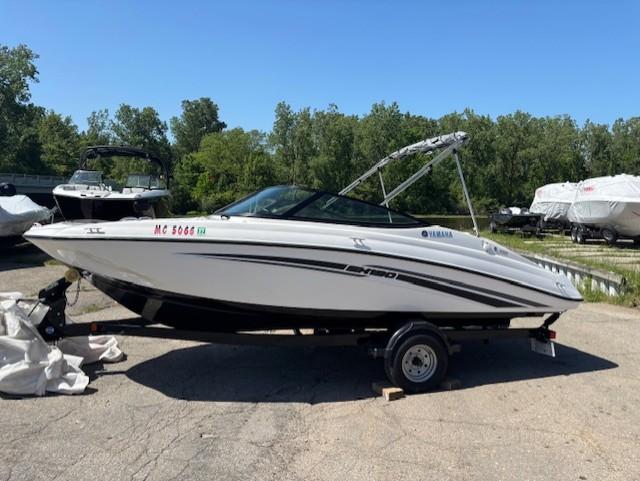 2017 Yamaha SX190 boat on trailer, parked outdoors on a sunny day.